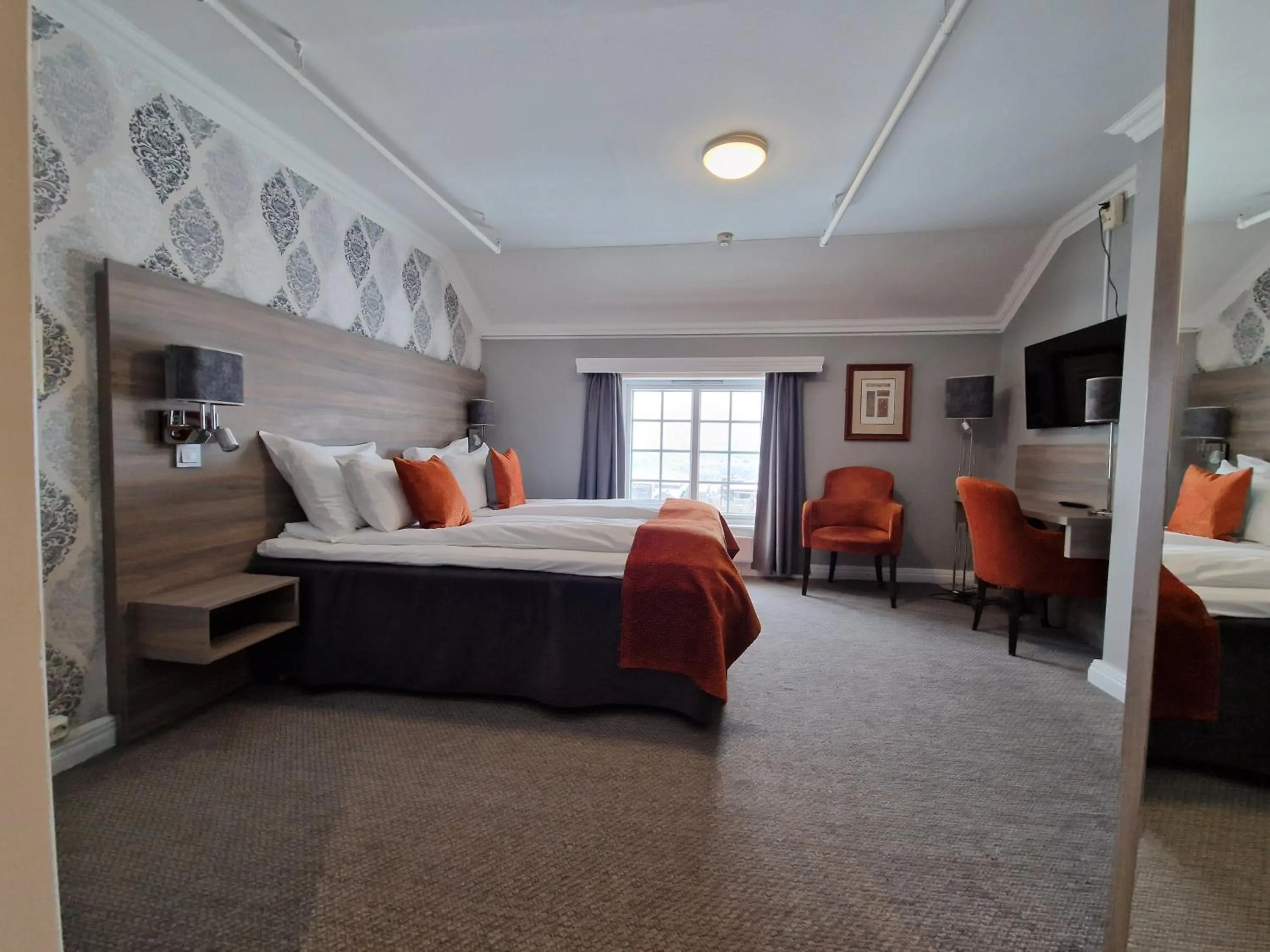 Bed in Dr. Holms Hotel