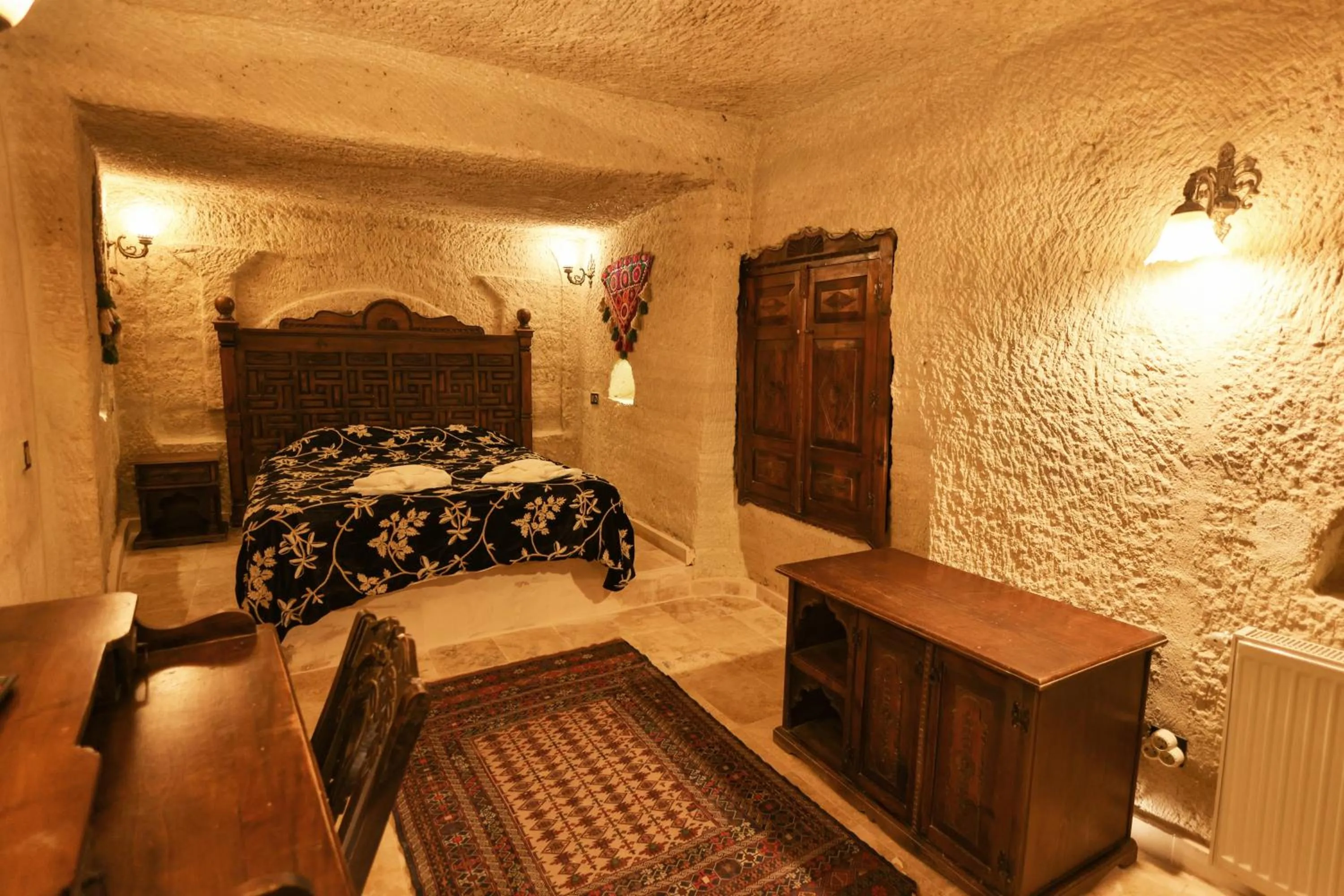 Bed in Travel Inn Cave Hotel