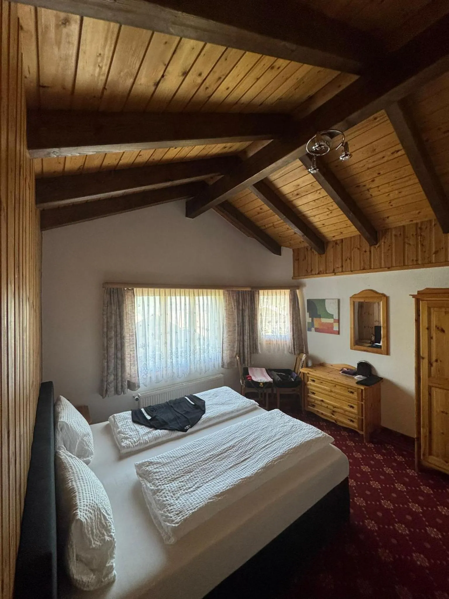 Bed in Hotel Alpina