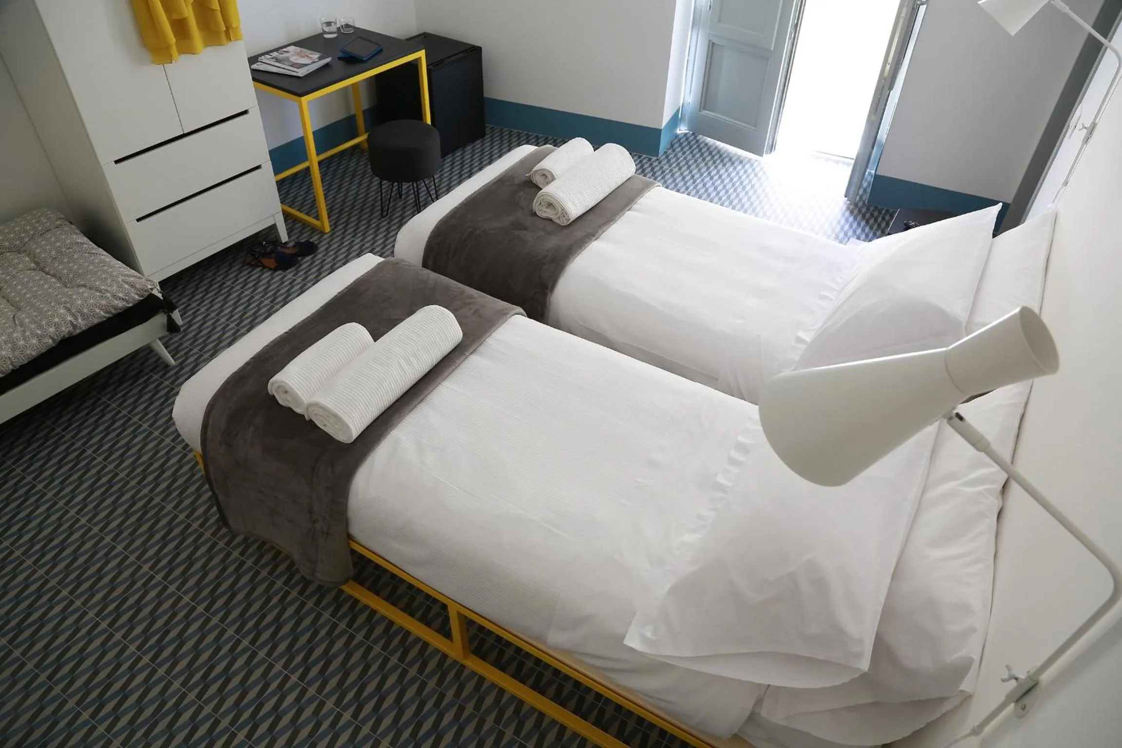 Bed in Intervallo Boutique Hotel