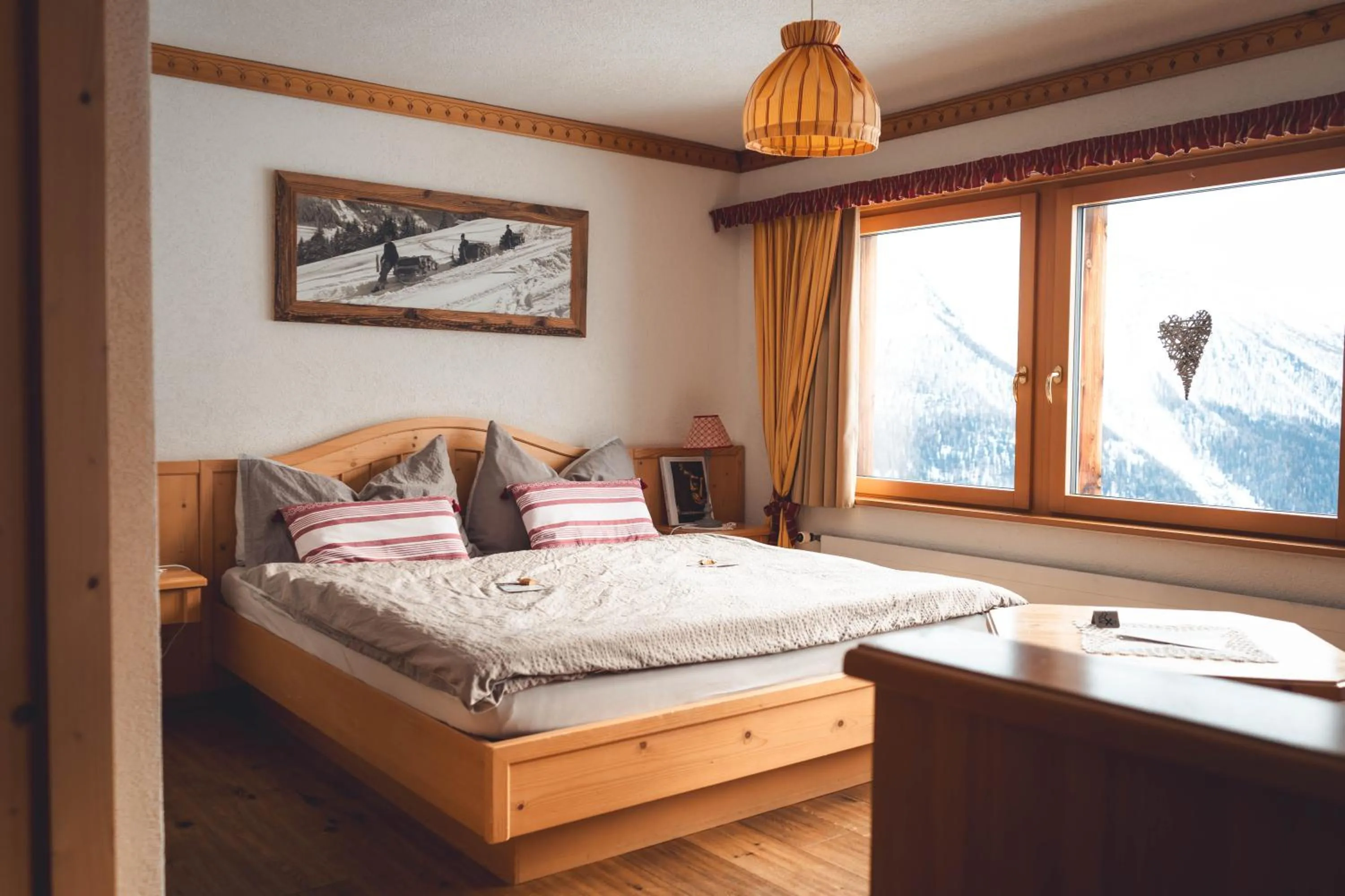 Photo of the whole room, Bed in Alpenhotel zur Wildi Lauchernalp