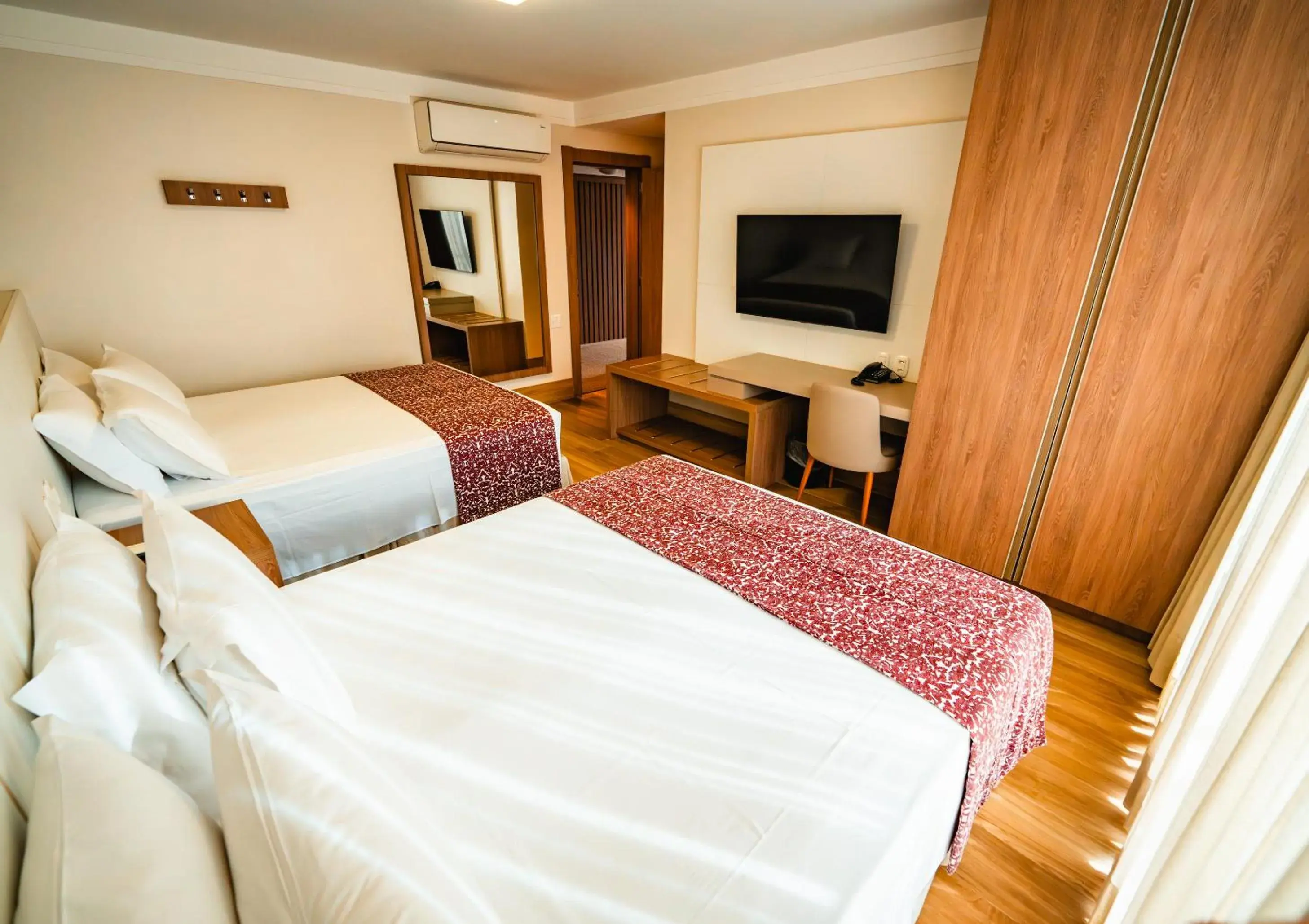 Quadruple Room - single occupancy in Hotel Vila Germânica Quadruple Room - single occupancy in Hotel Vila Germânica