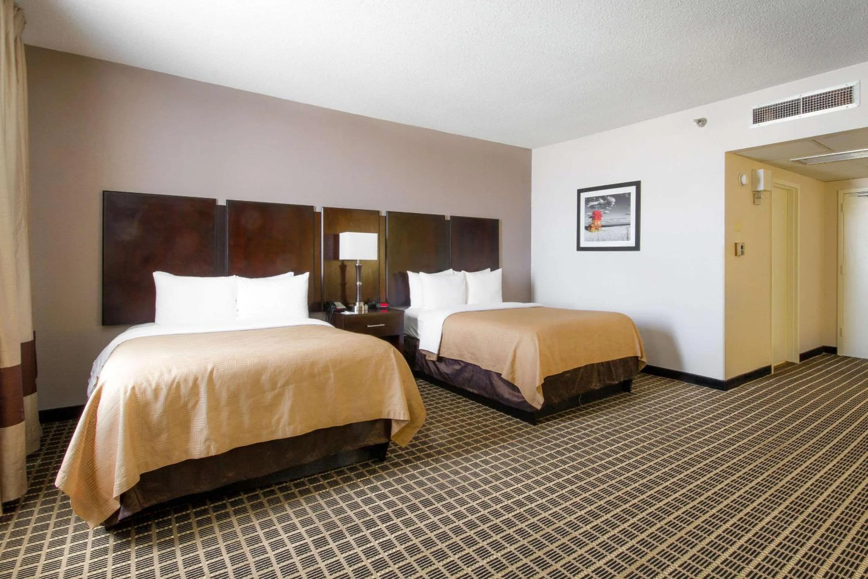 Bedroom, Bed in Clarion Inn & Suites Miami International Airport