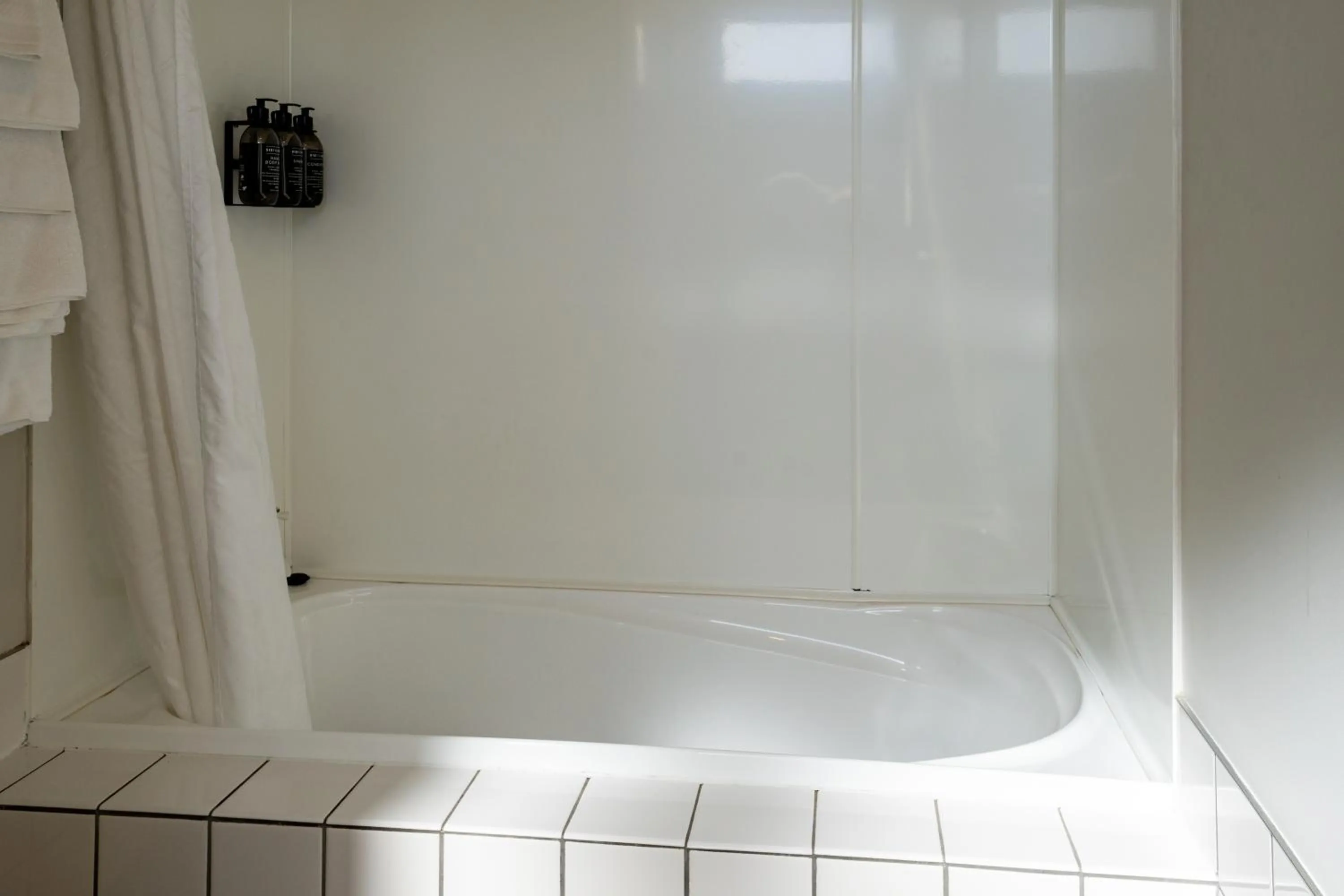 Bath in ASURE Gables Motor Lodge