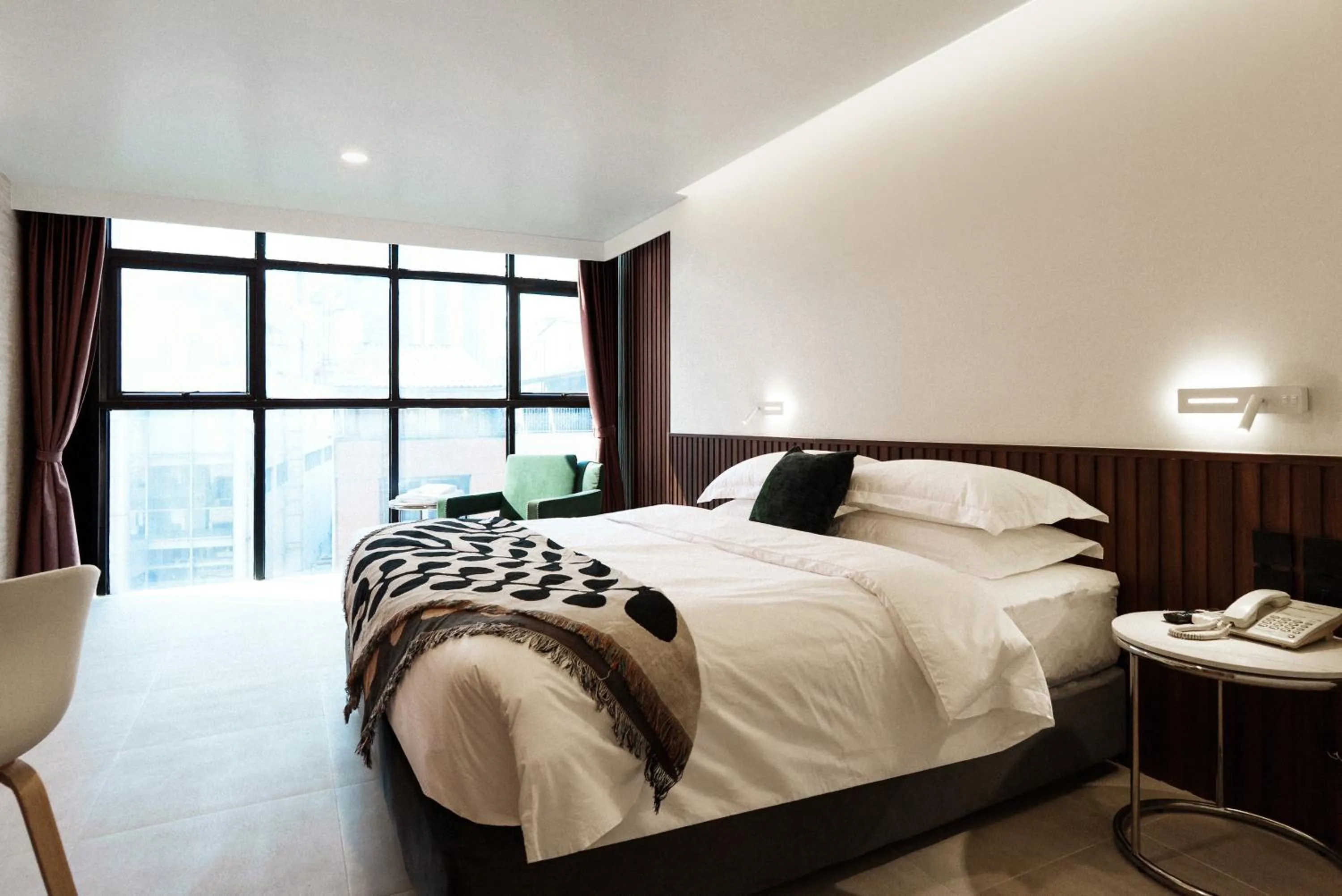 Bed in Grand Inn Hotel