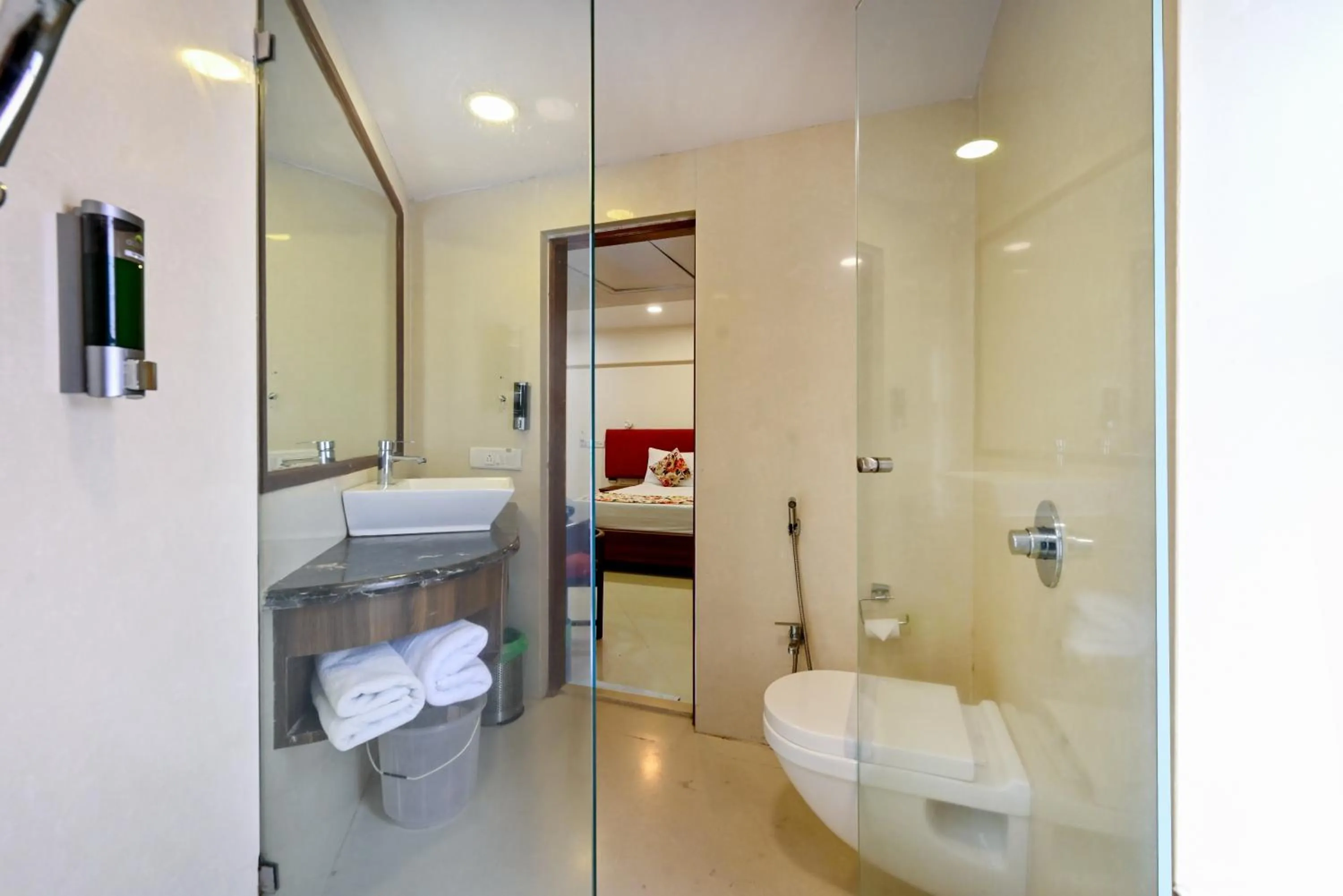 Bathroom, Bed in Hotel Parle International