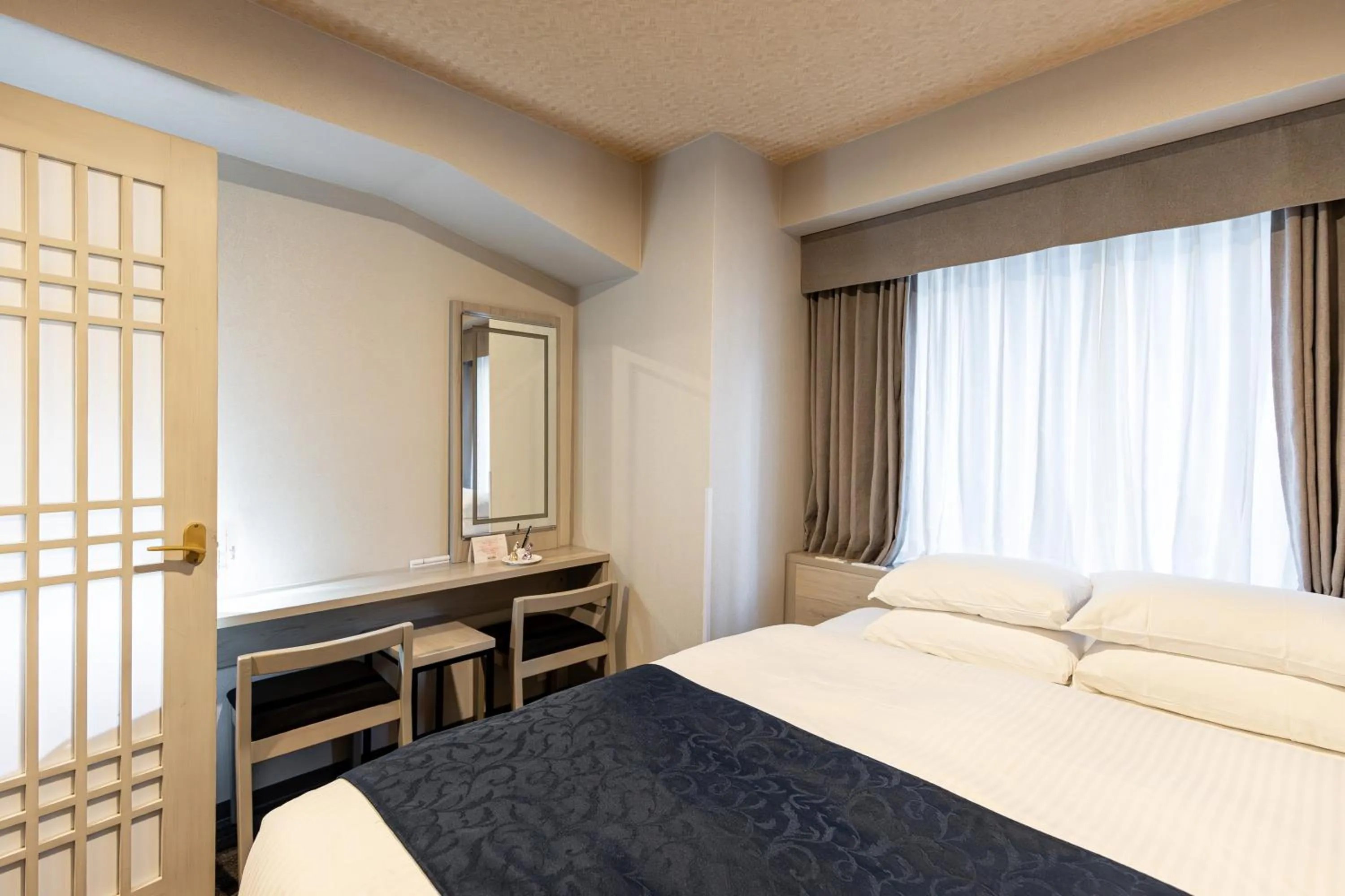 Bed in Hotel Rose Garden Shinjuku