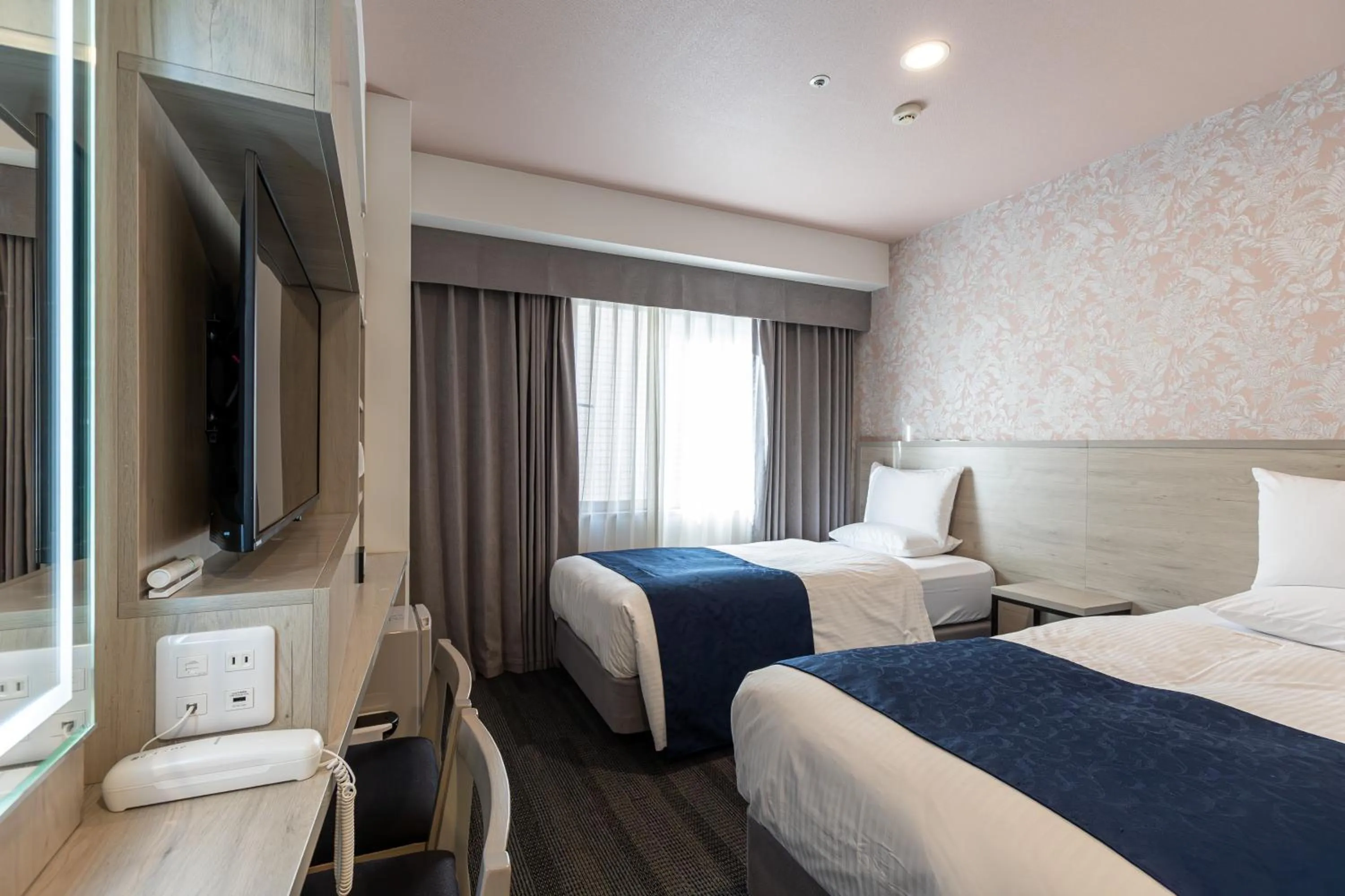 Bed in Hotel Rose Garden Shinjuku