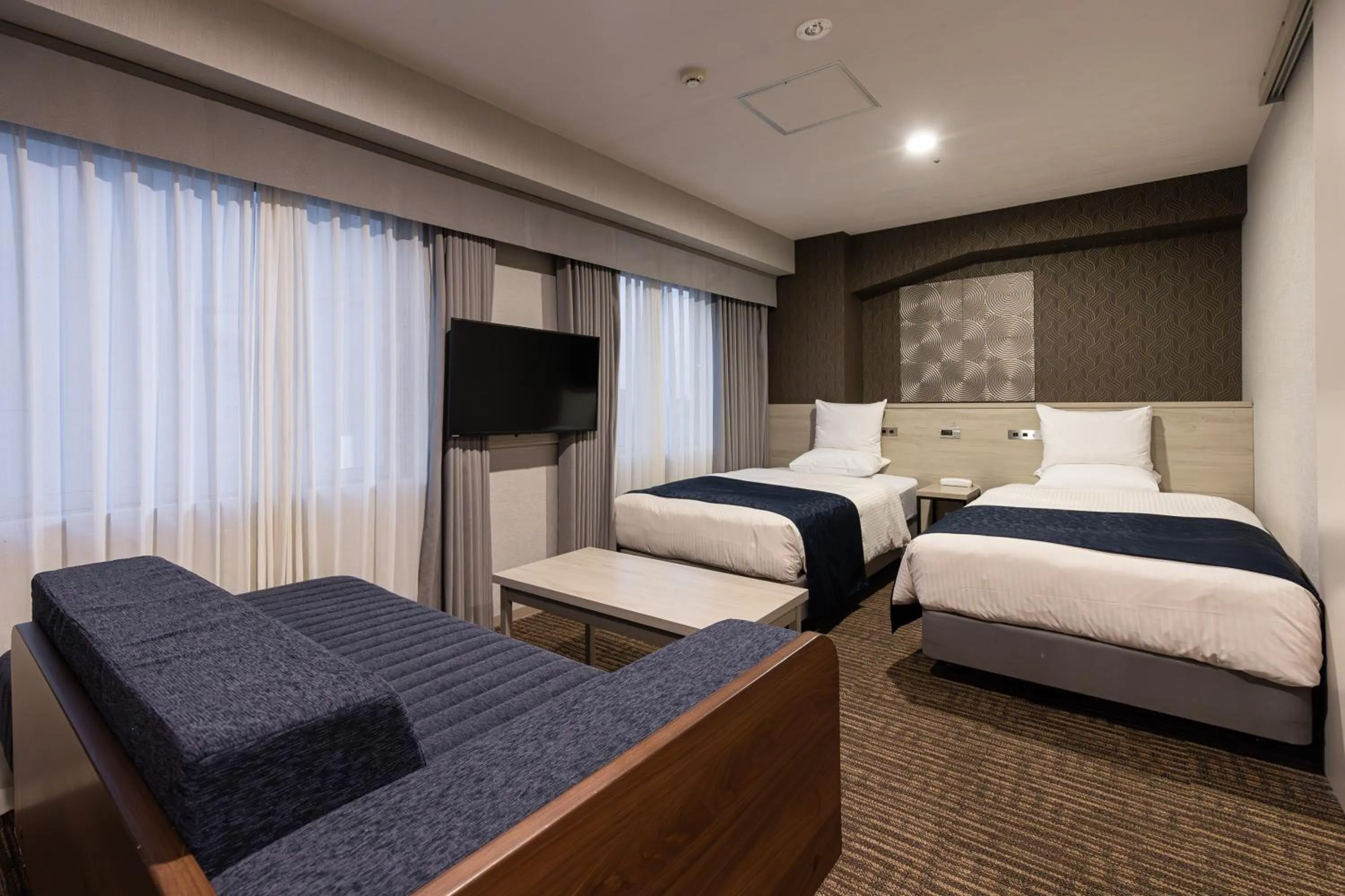 Bed in Hotel Rose Garden Shinjuku