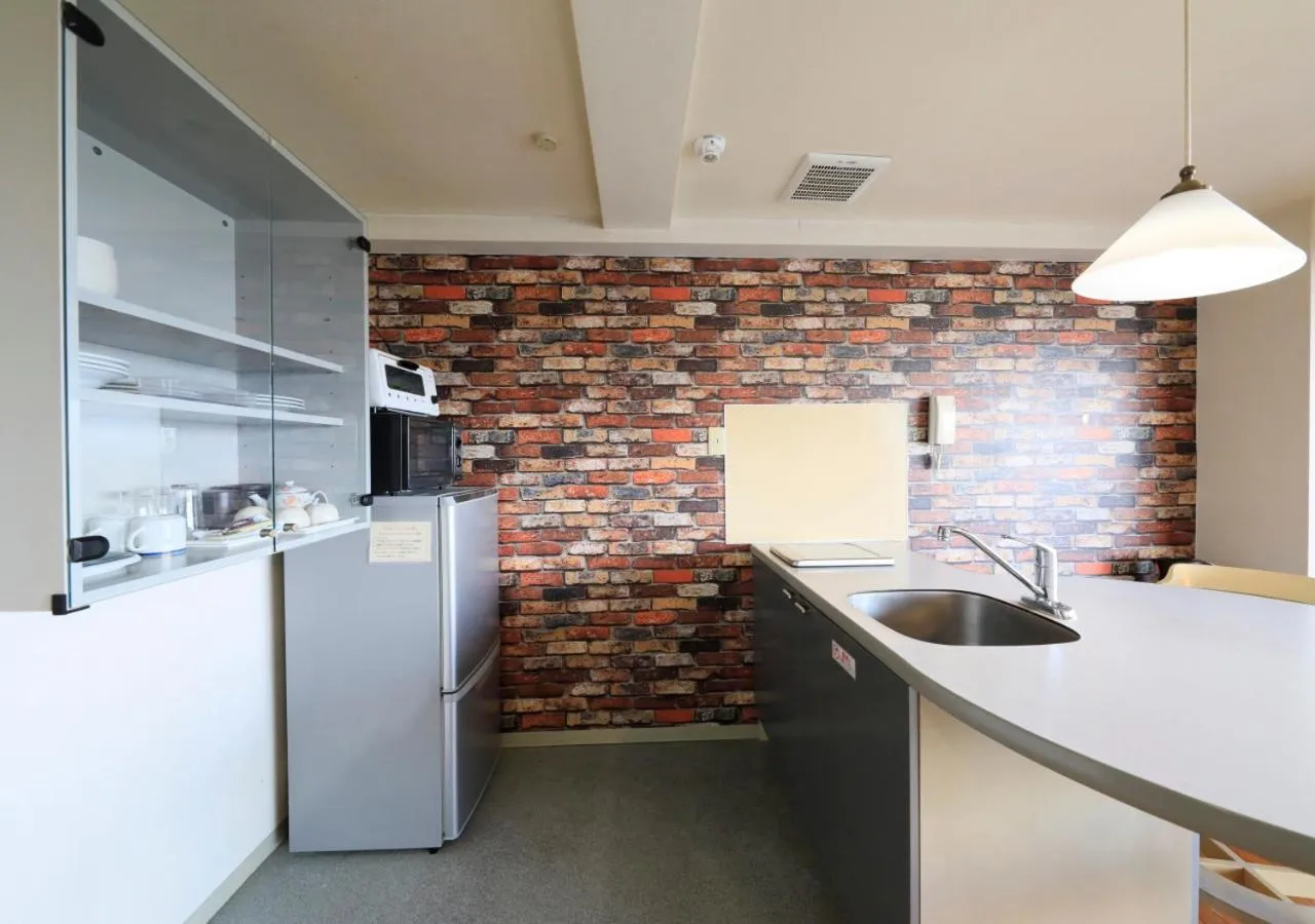 Kitchen or kitchenette in Katsuura Hilltop Hotel & Residence