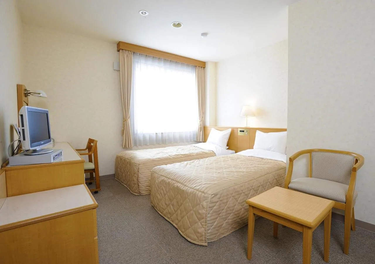 Bed in Shibetsu Grand Hotel