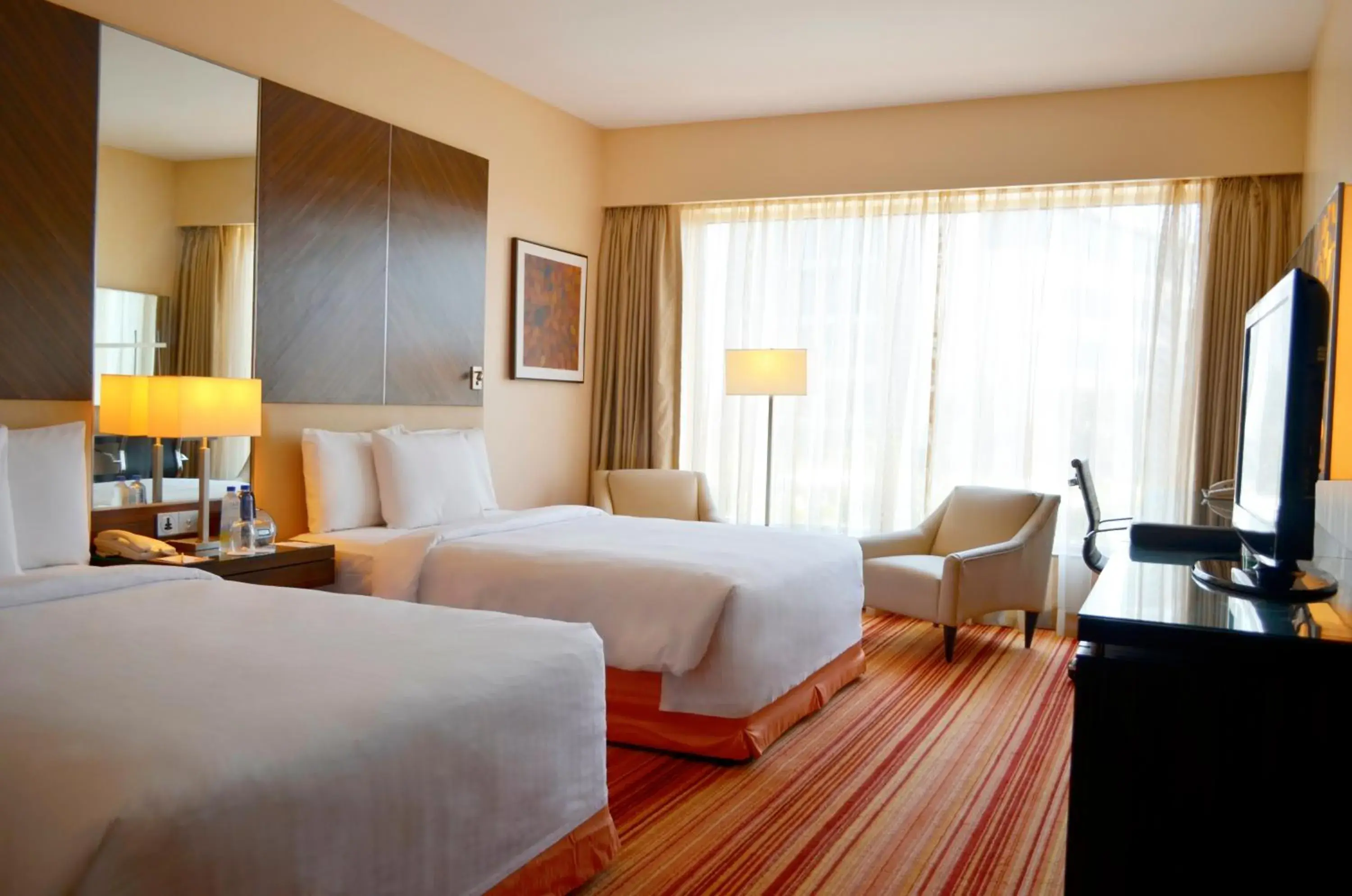 Deluxe Twin Room with Pool View - 15% off on Spa and 20% off on Laundry in Courtyard by Marriott Mumbai International Airport Deluxe Twin Room with Pool View - 15% off on Spa and 20% off on Laundry in Courtyard by Marriott Mumbai International Airport