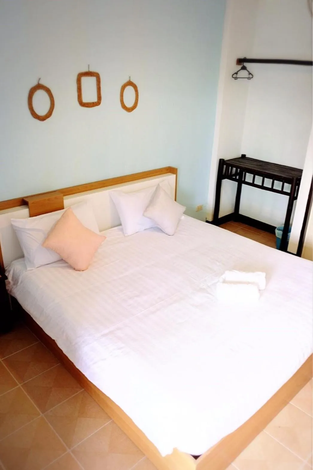 Bed in Yen Aura Boutique Hotel