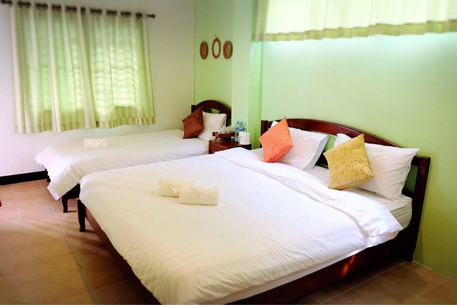 Bed in Yen Aura Boutique Hotel