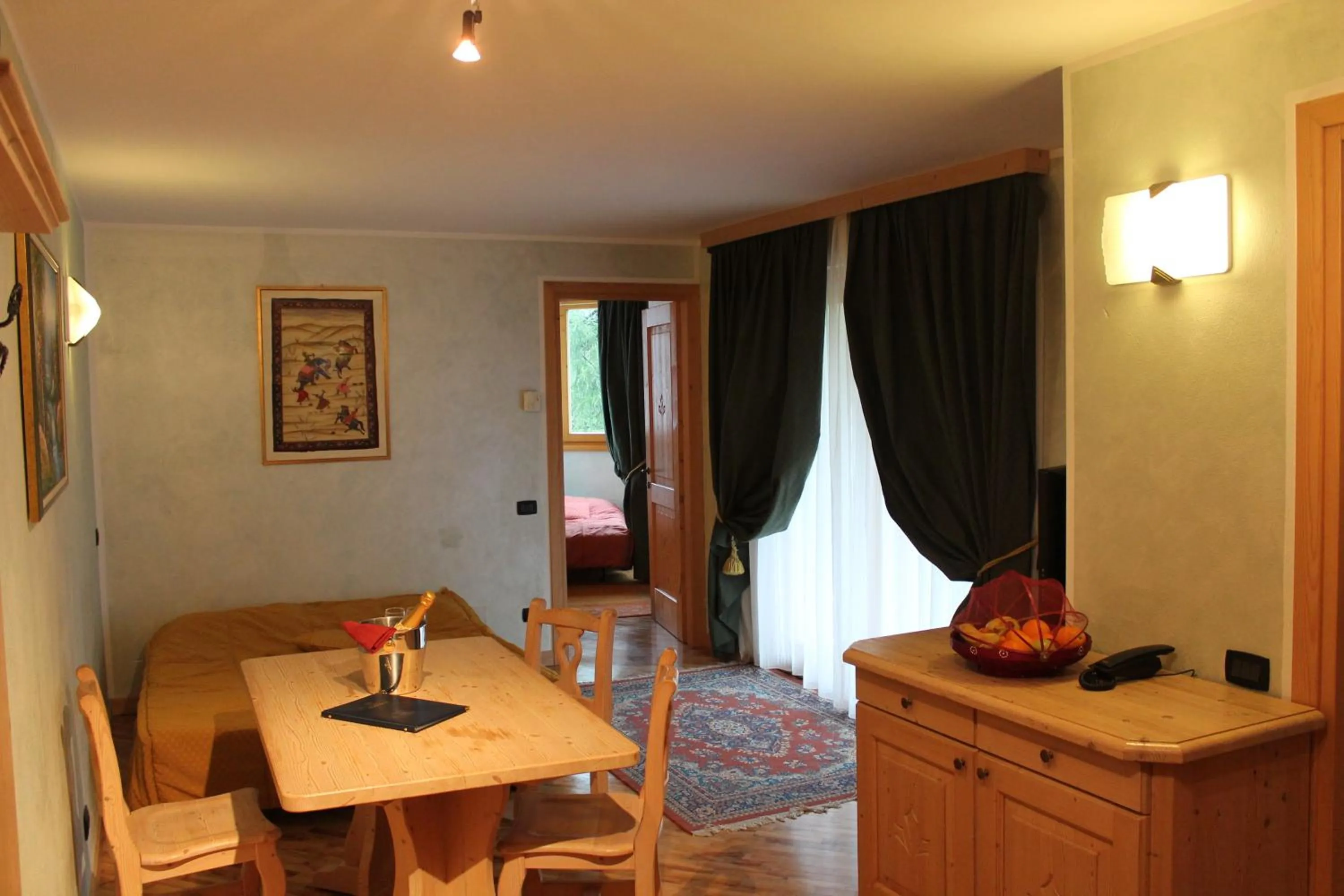 Seating area in Boscone Suite Hotel