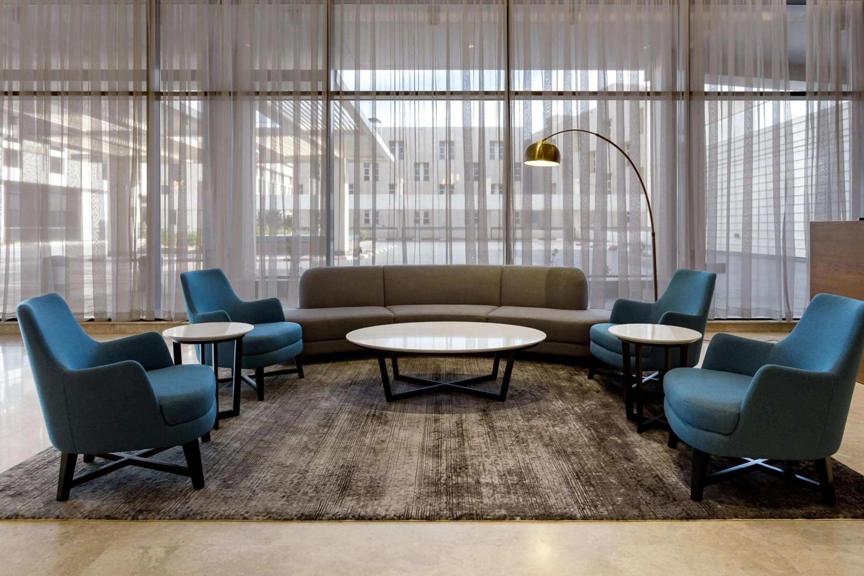 Lobby or reception in Radisson Hotel & Apartments Dammam Industrial City