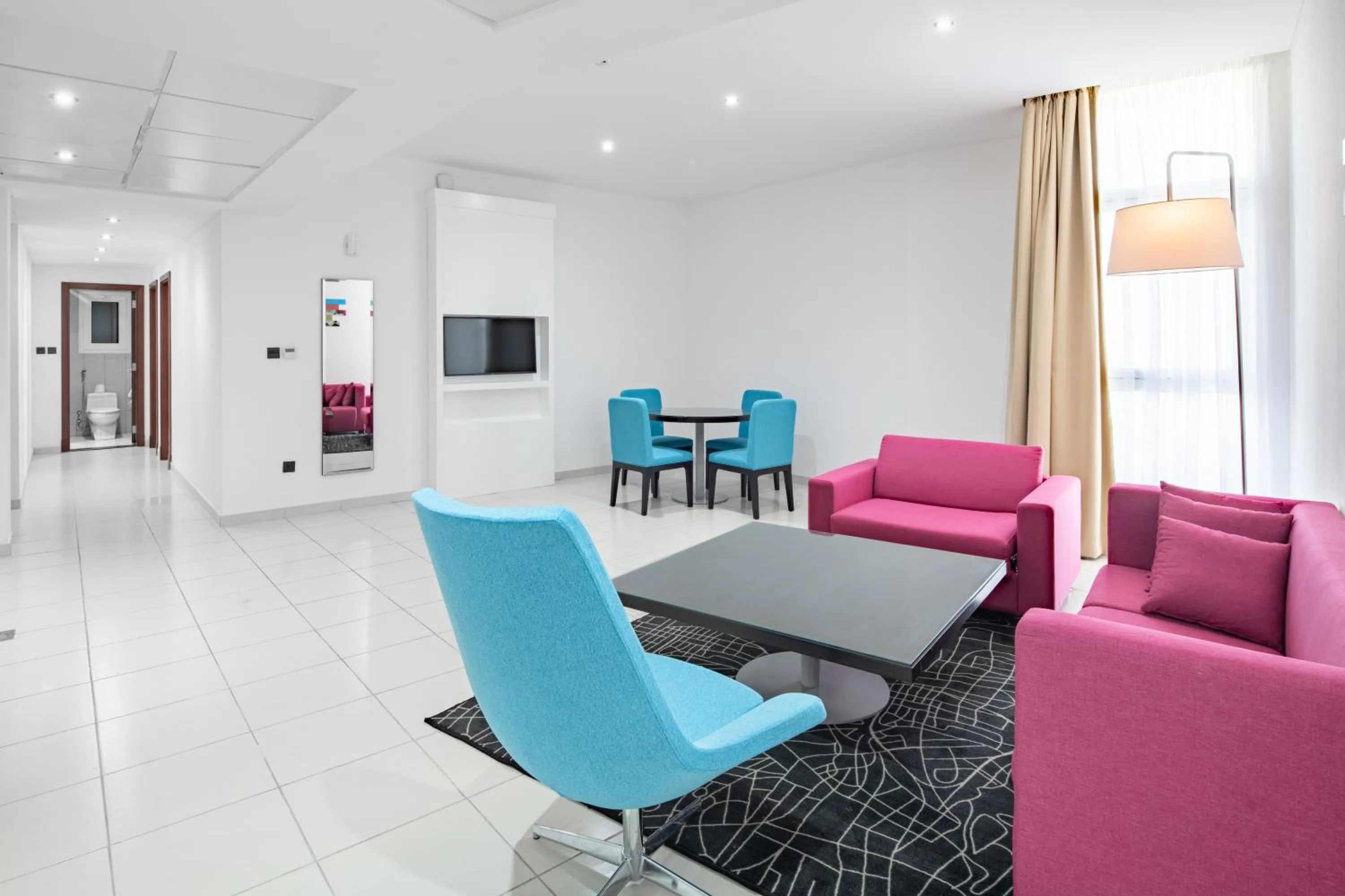 Living room in Radisson Hotel & Apartments Dammam Industrial City