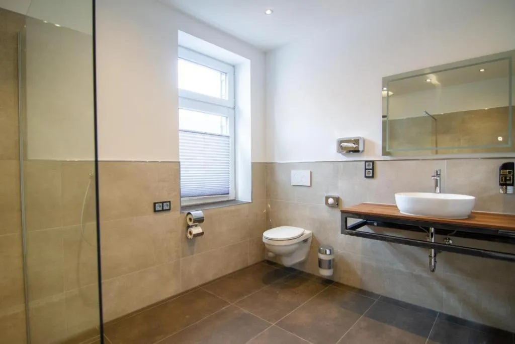 Bathroom in Schiefer Suite Hotel & Apartments