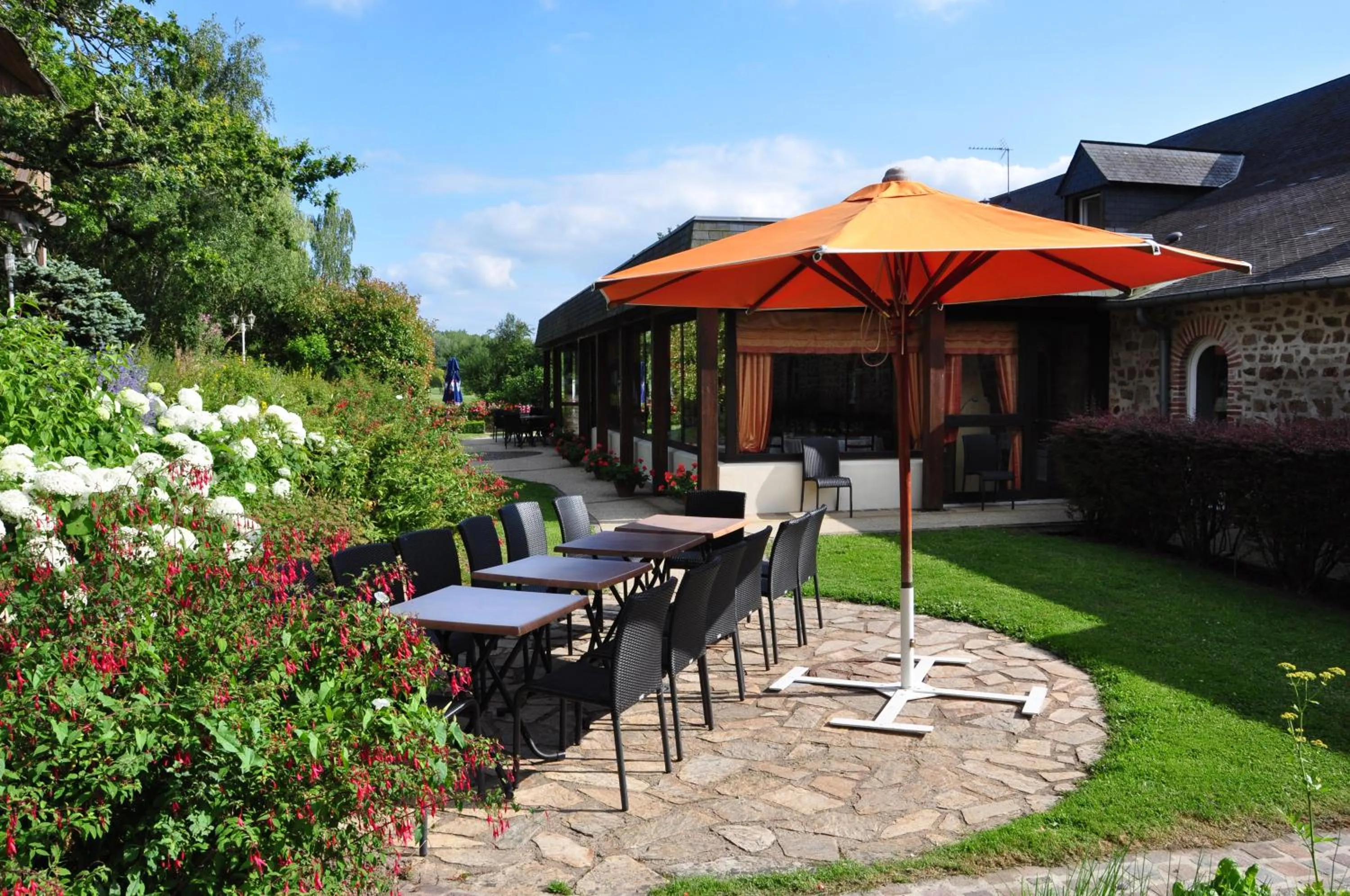 Patio in Logis Hôtel Restaurant Relais Du Gué De Selle