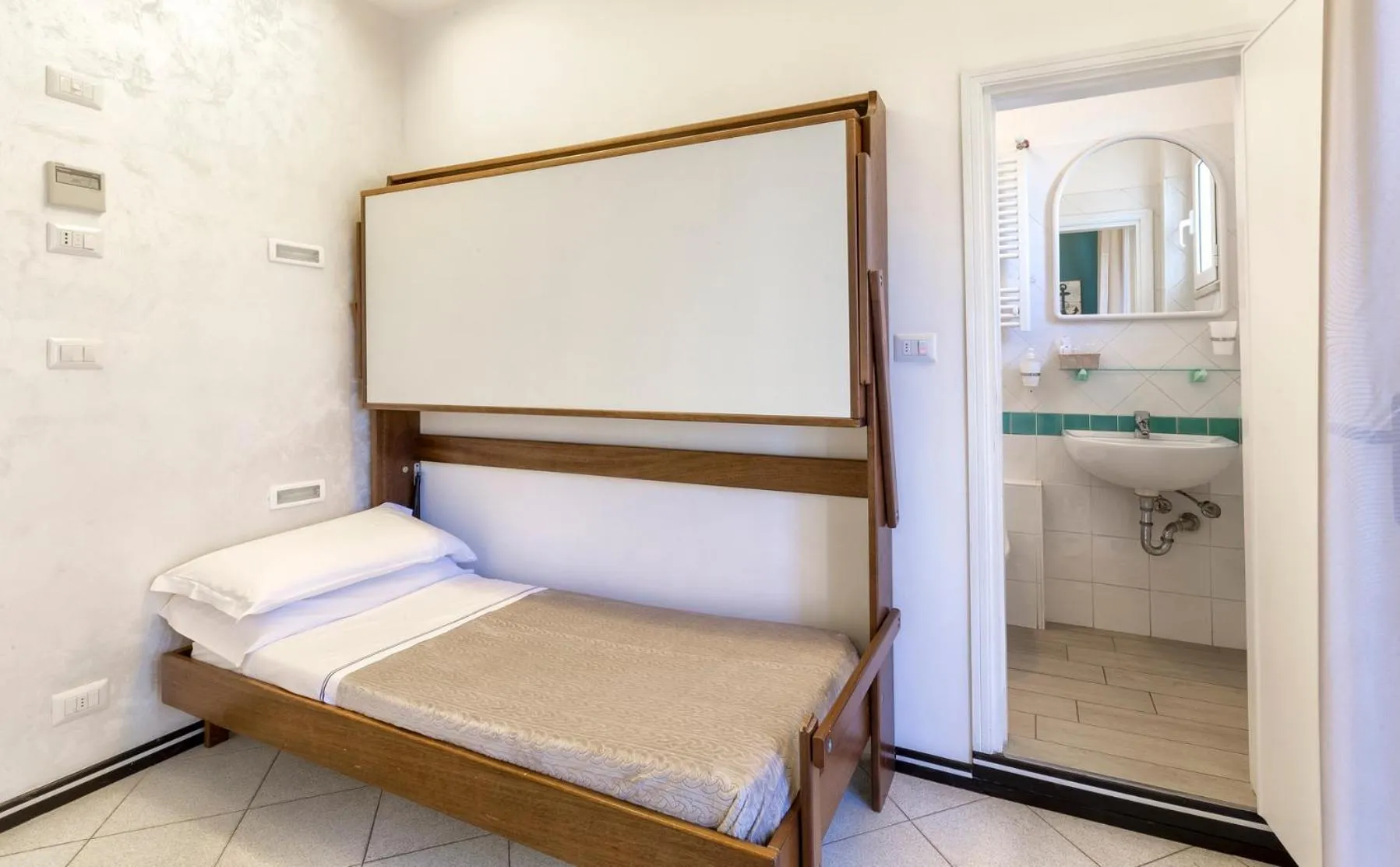 Bed in Hotel La Nidiola