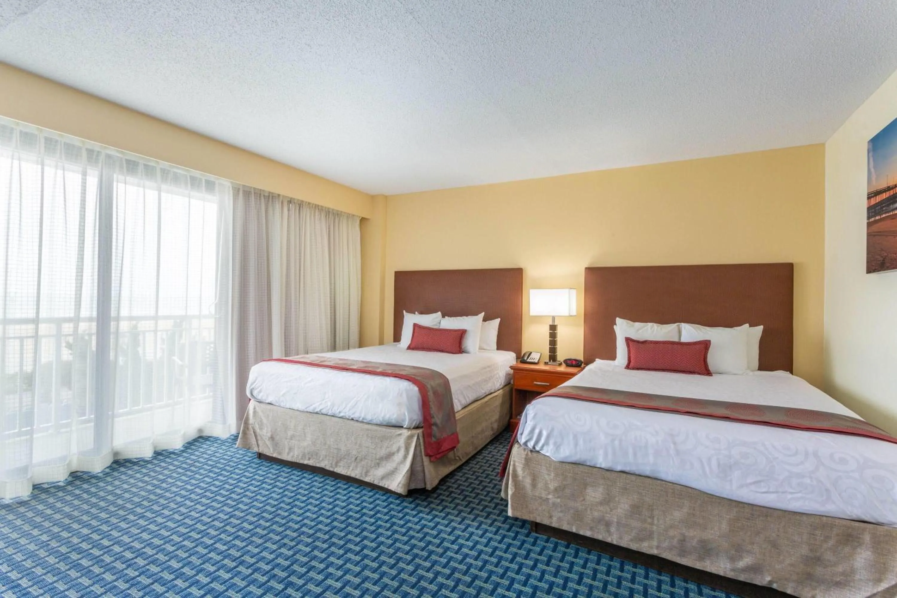 Photo of the whole room, Bed in Ramada Plaza by Wyndham Virginia Beach Oceanfront