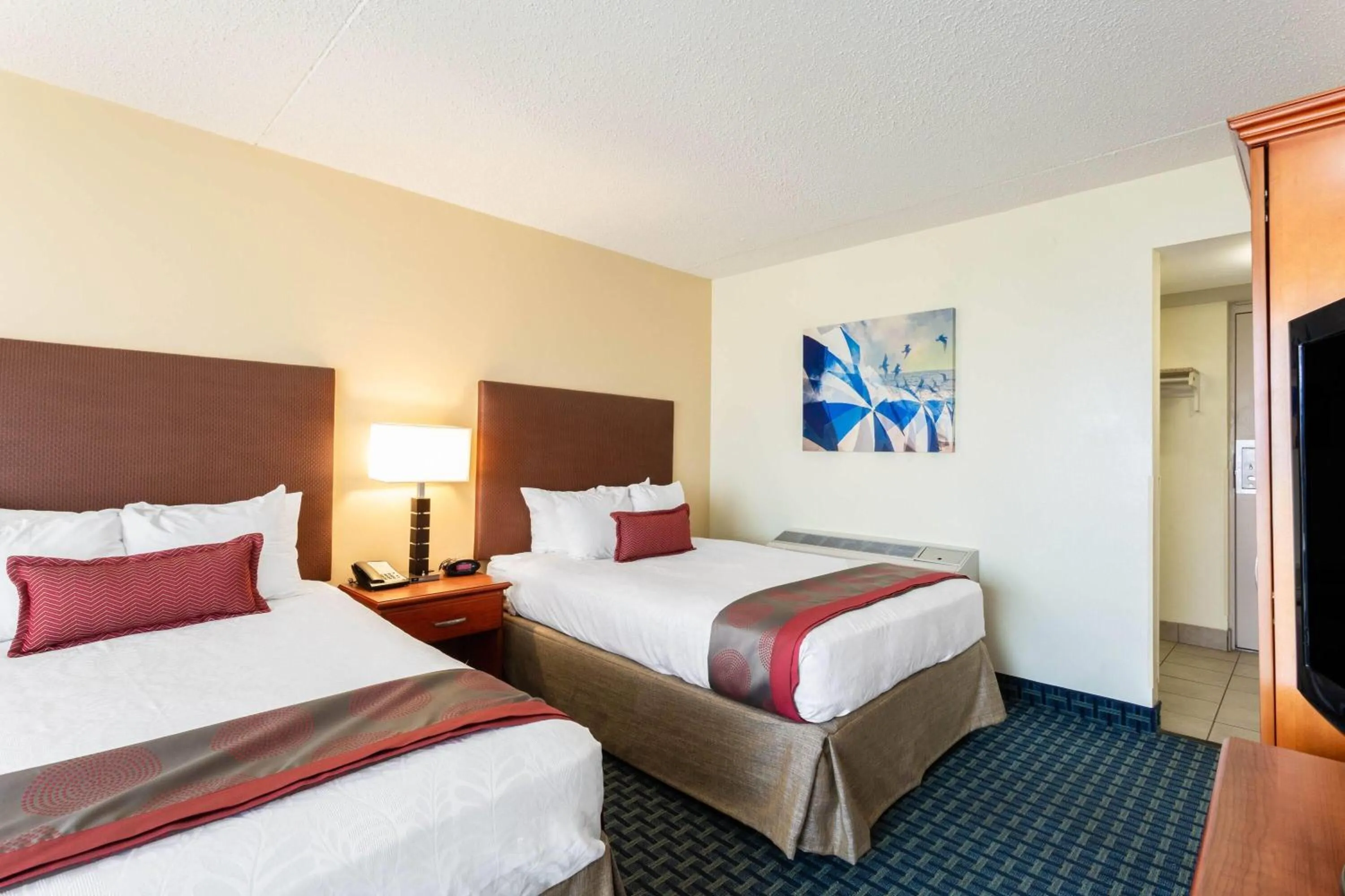 Photo of the whole room, Bed in Ramada Plaza by Wyndham Virginia Beach Oceanfront