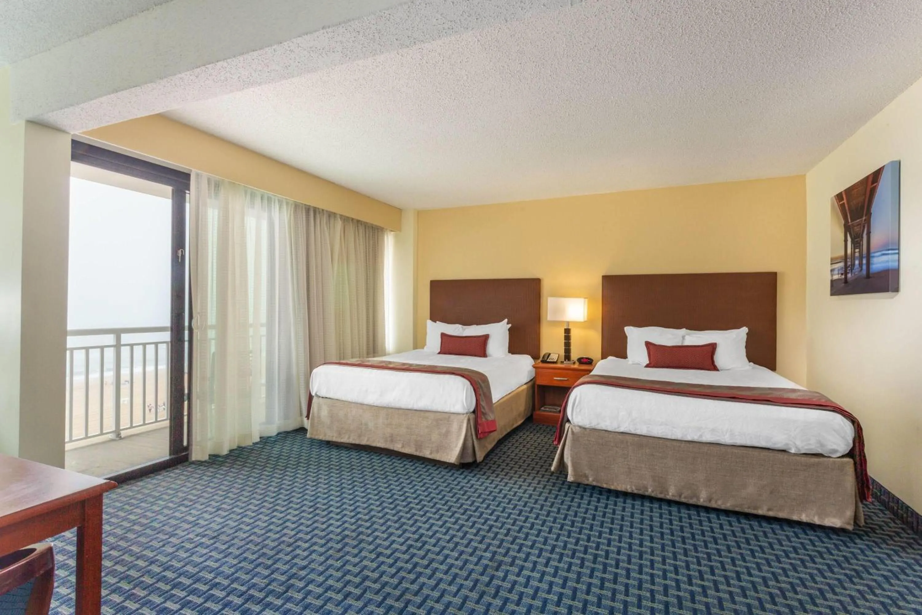 Photo of the whole room, Bed in Ramada Plaza by Wyndham Virginia Beach Oceanfront