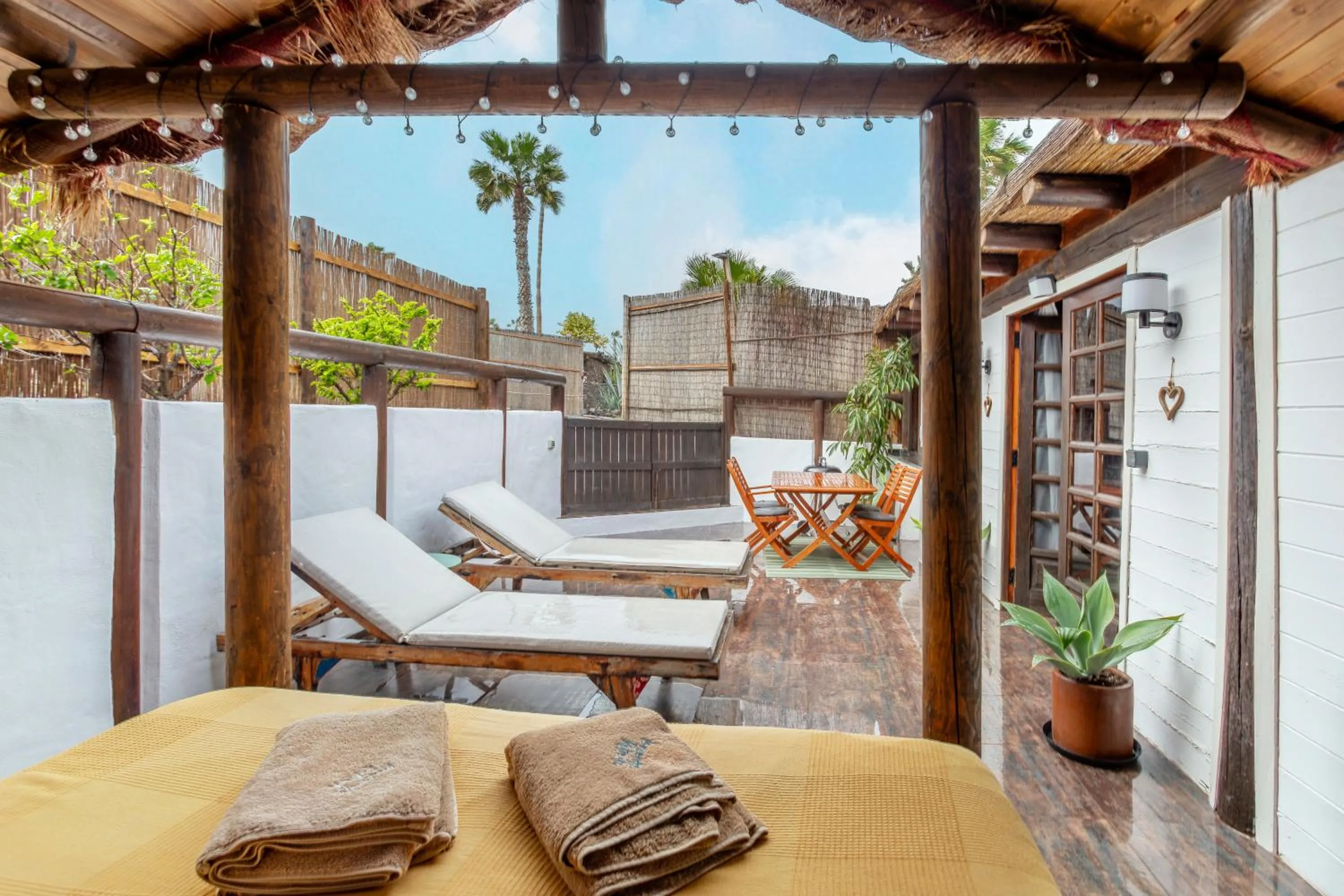 Patio in Finca De Arrieta Village - Yurts and Stone Cottages - Shared Pool - Walking distance to Arrieta Beach - Off Grid