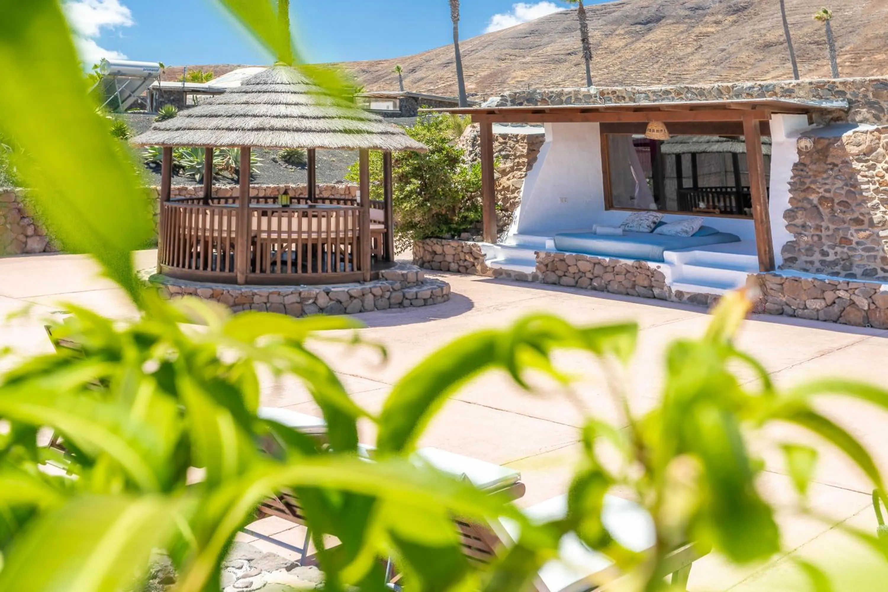 Patio in Finca De Arrieta Village - Yurts and Stone Cottages - Shared Pool - Walking distance to Arrieta Beach - Off Grid