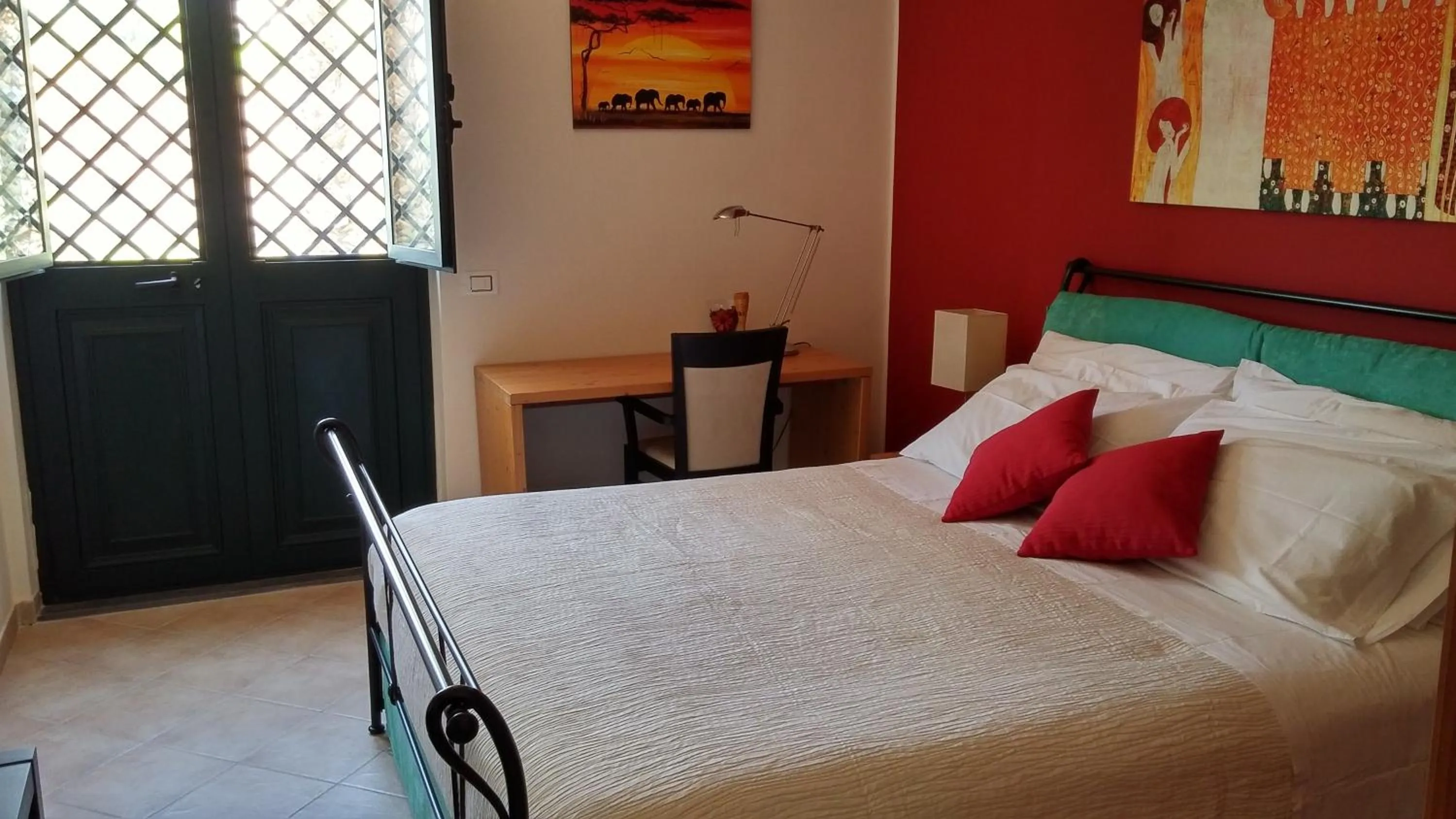 Photo of the whole room, Bed in La Casa del Melograno