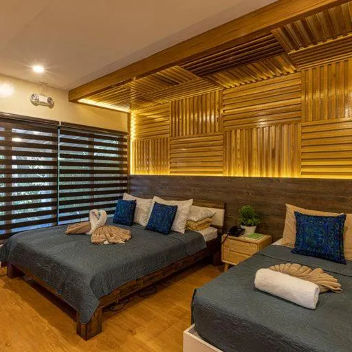 Bed in Noni's Resort