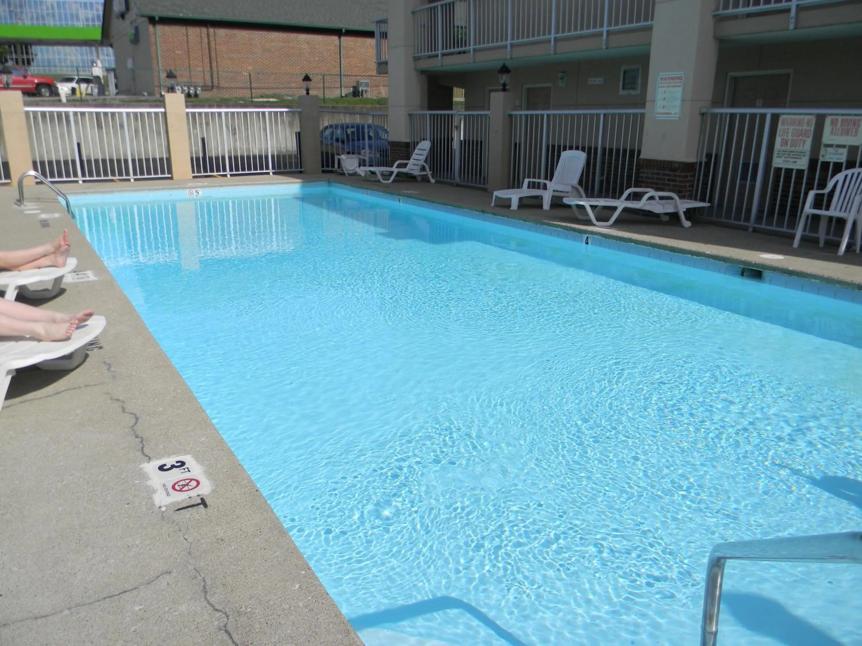 Swimming pool in Days Inn by Wyndham Airport Nashville East