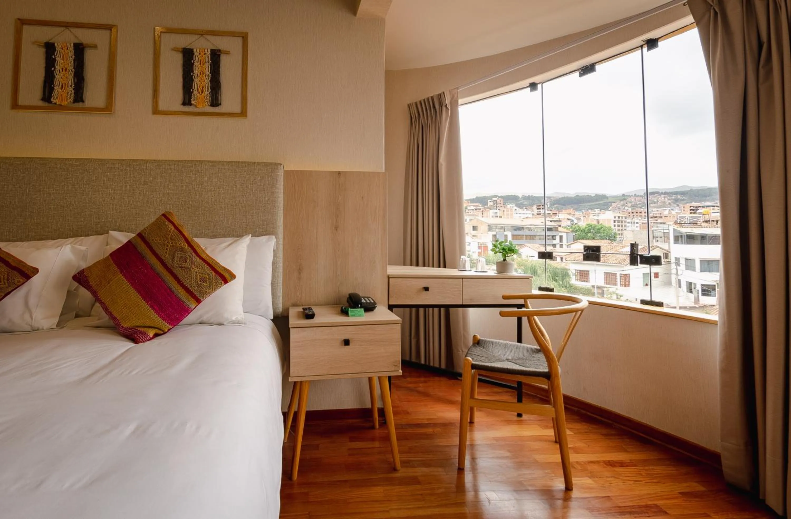 View (from property/room), Bed in Torre Dorada Cusco