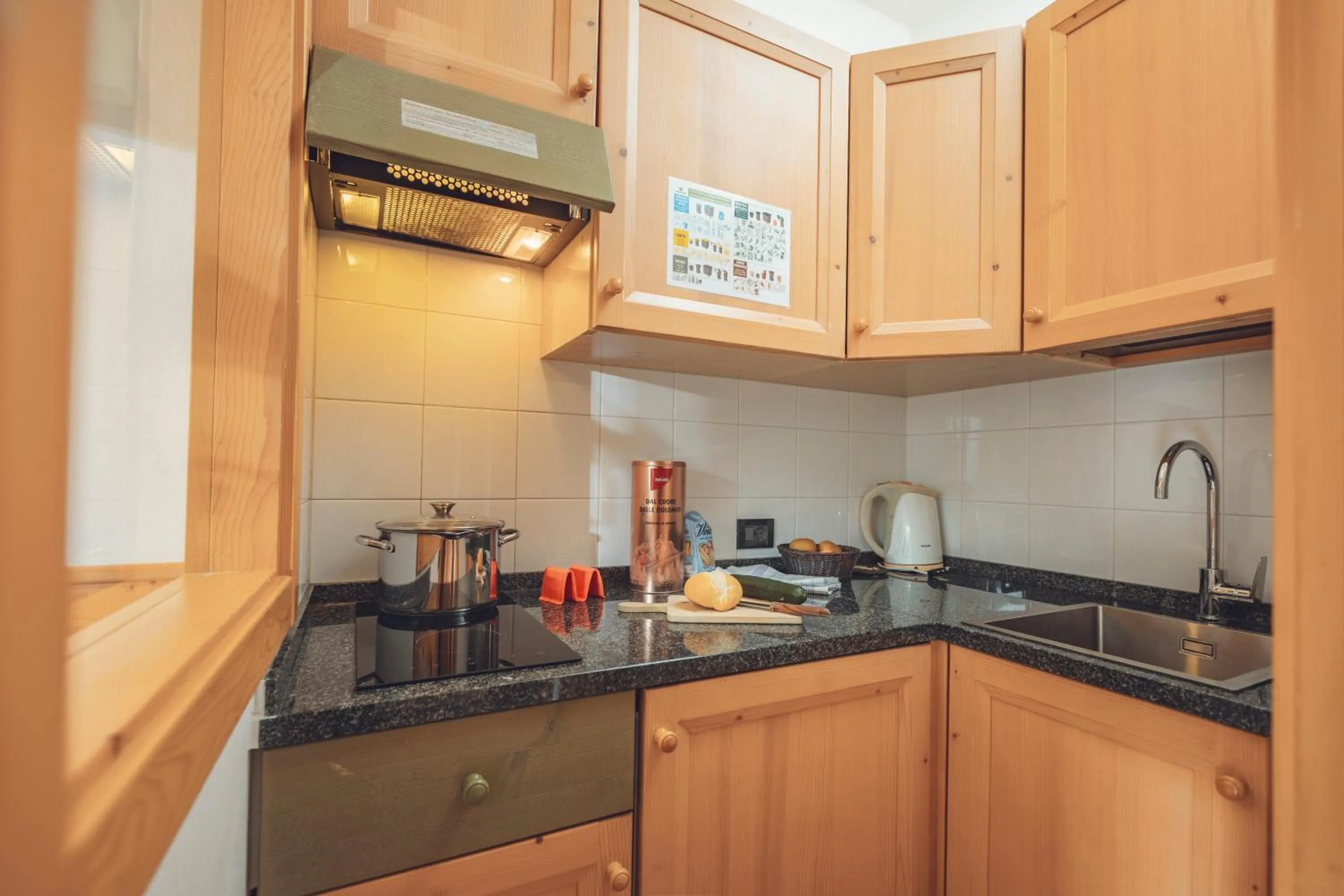 Kitchen or kitchenette in Aparthotel Majestic