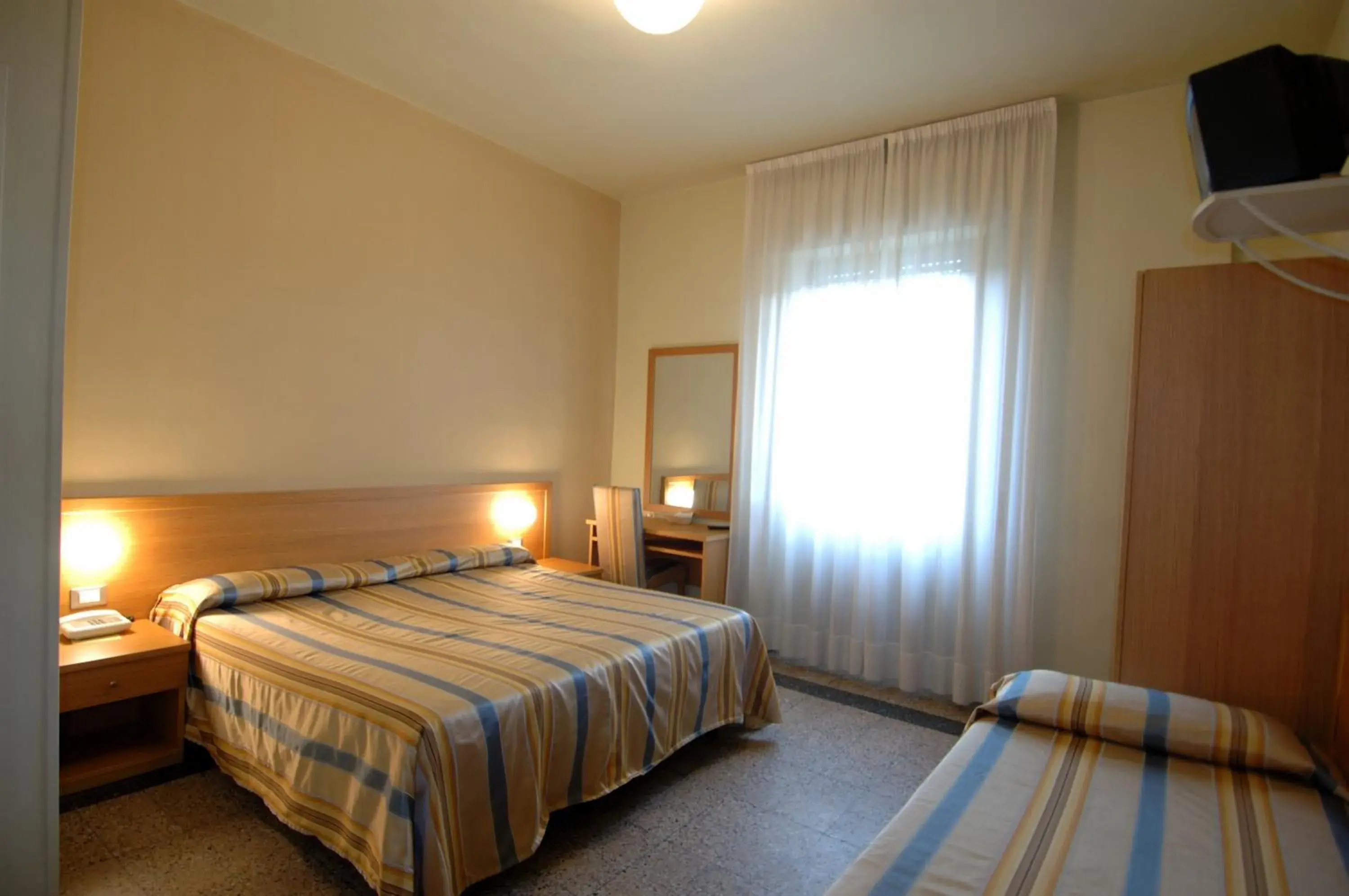 Triple Room in Hotel Moderno Triple Room in Hotel Moderno