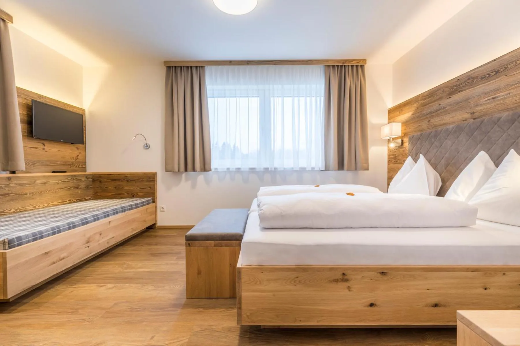 Bedroom in OFENTÜRL alpine living