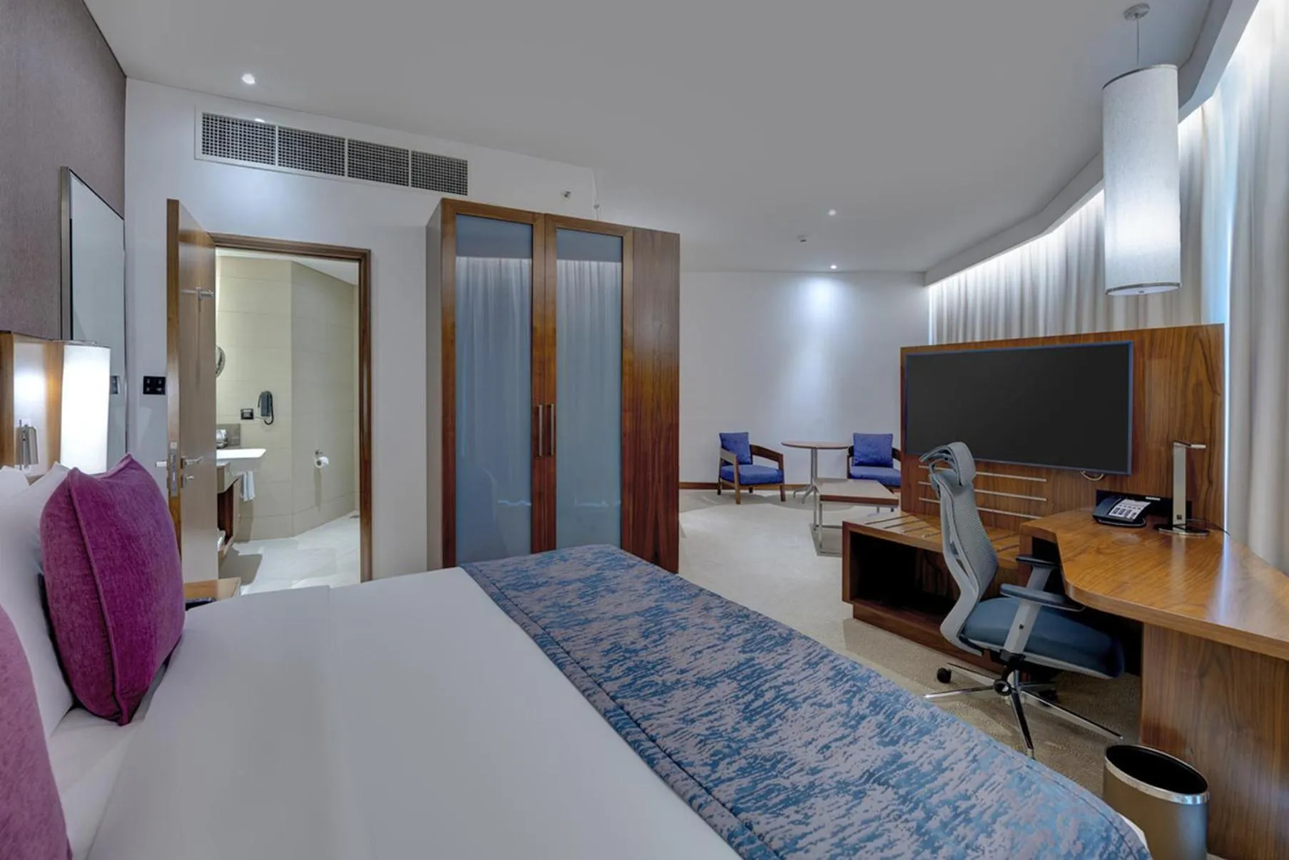 Photo of the whole room, Bed in Crowne Plaza Muscat OCEC by IHG