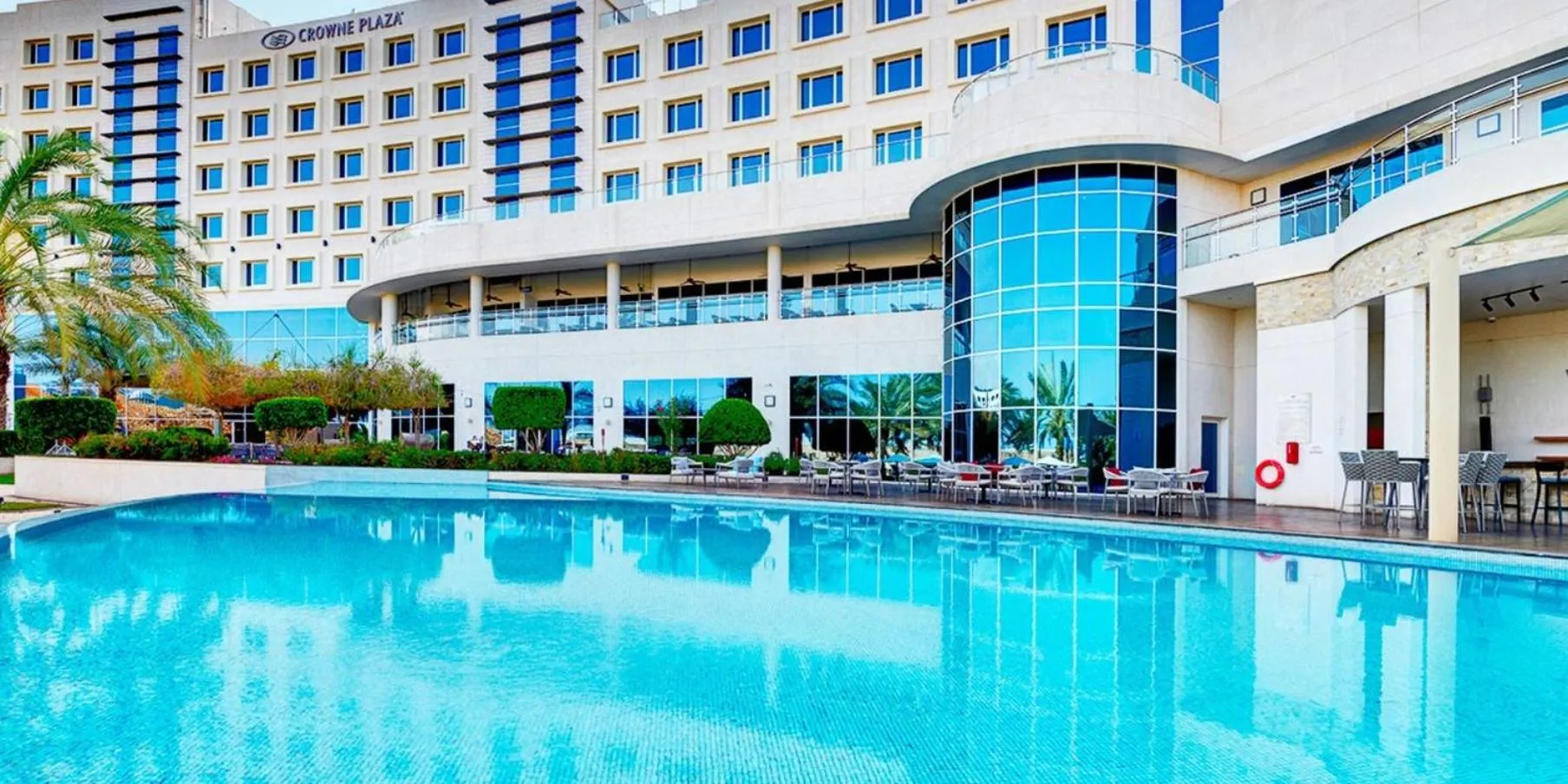 Swimming pool in Crowne Plaza Muscat OCEC by IHG