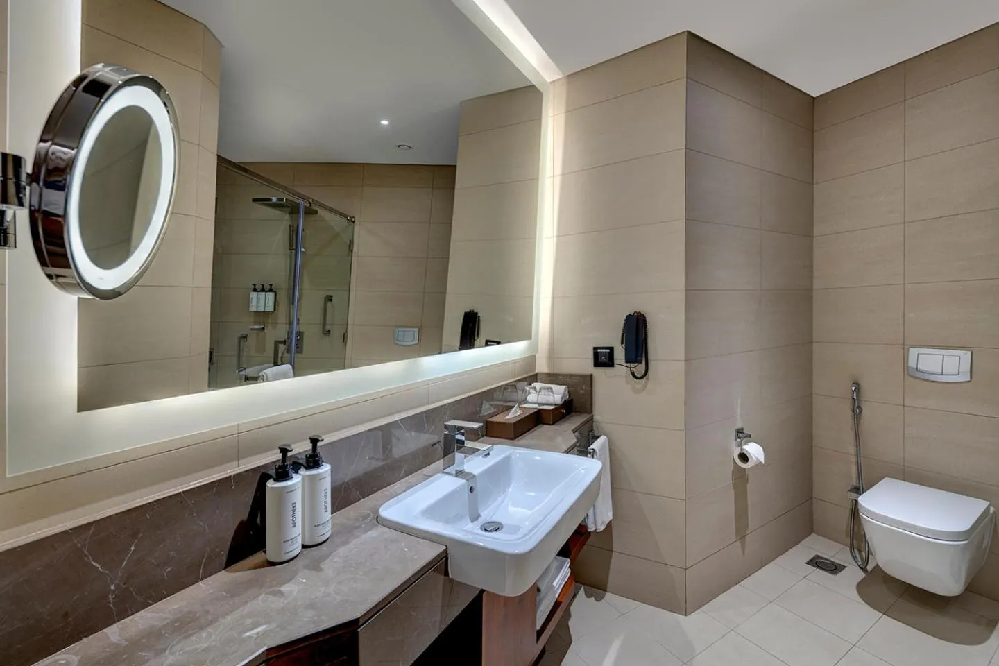 Bathroom in Crowne Plaza Muscat OCEC by IHG
