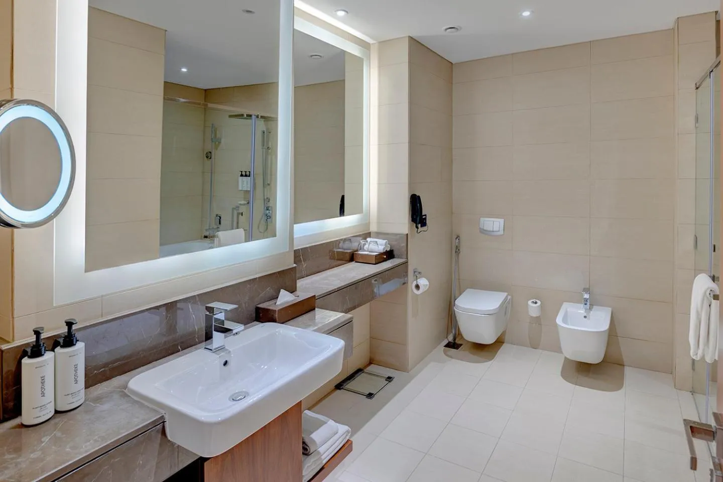Bathroom in Crowne Plaza Muscat OCEC by IHG