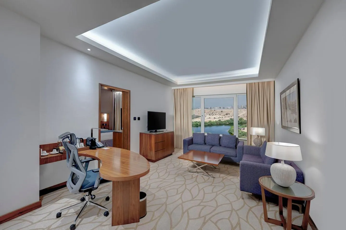 Living room in Crowne Plaza Muscat OCEC by IHG