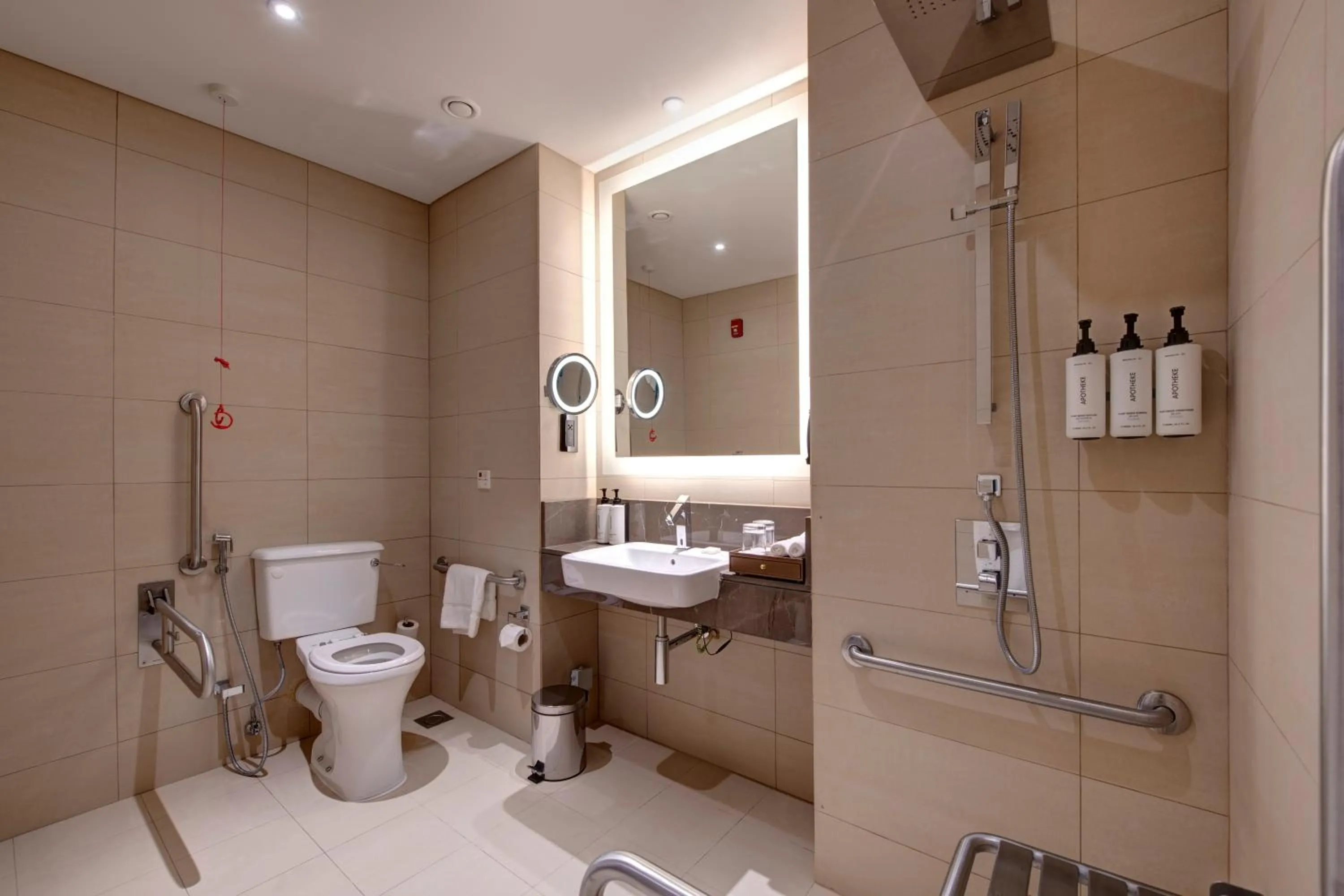 Toilet in Crowne Plaza Muscat OCEC by IHG