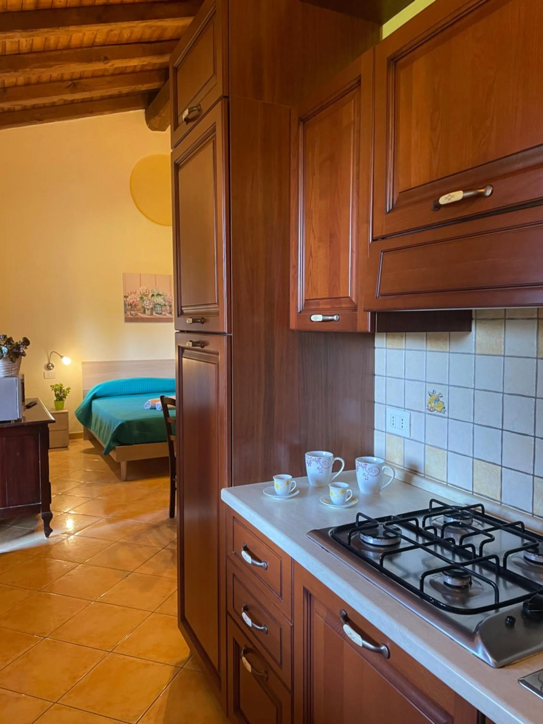 kitchen, Bed in La Fontana Dei Desideri
