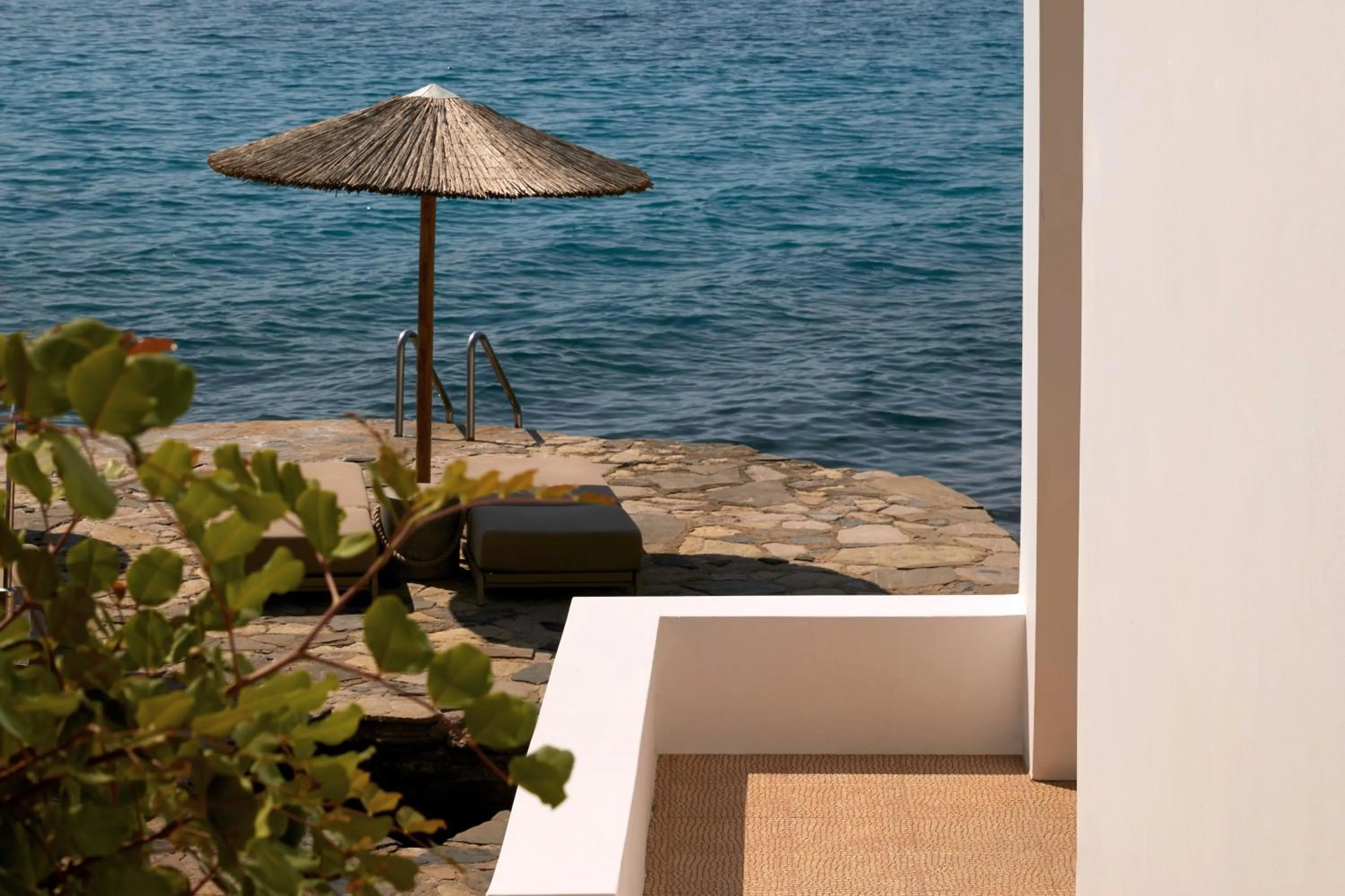 Patio in Minos Beach Art Hotel, a Member of Design Hotels