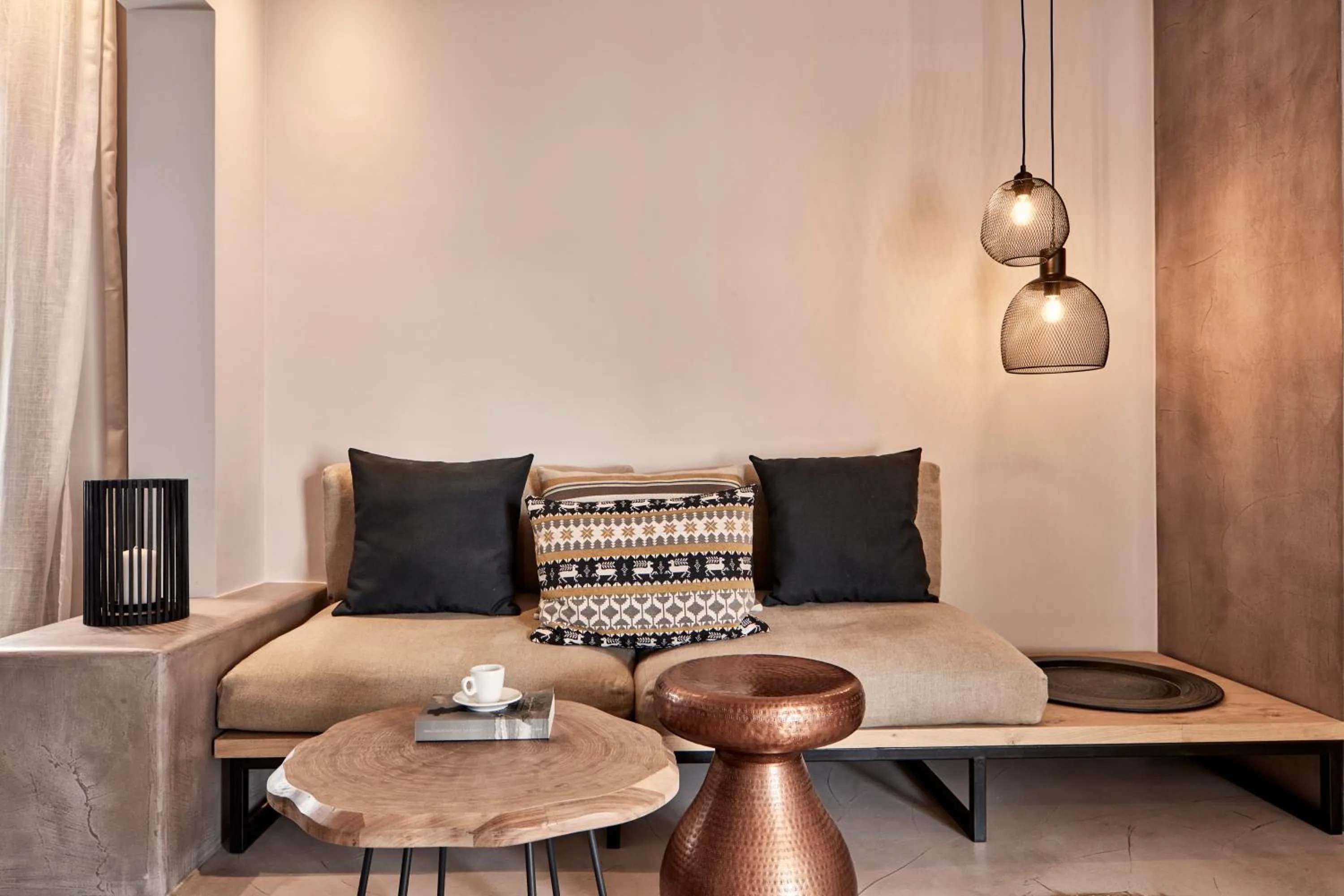 Seating area in Minos Beach Art Hotel, a Member of Design Hotels