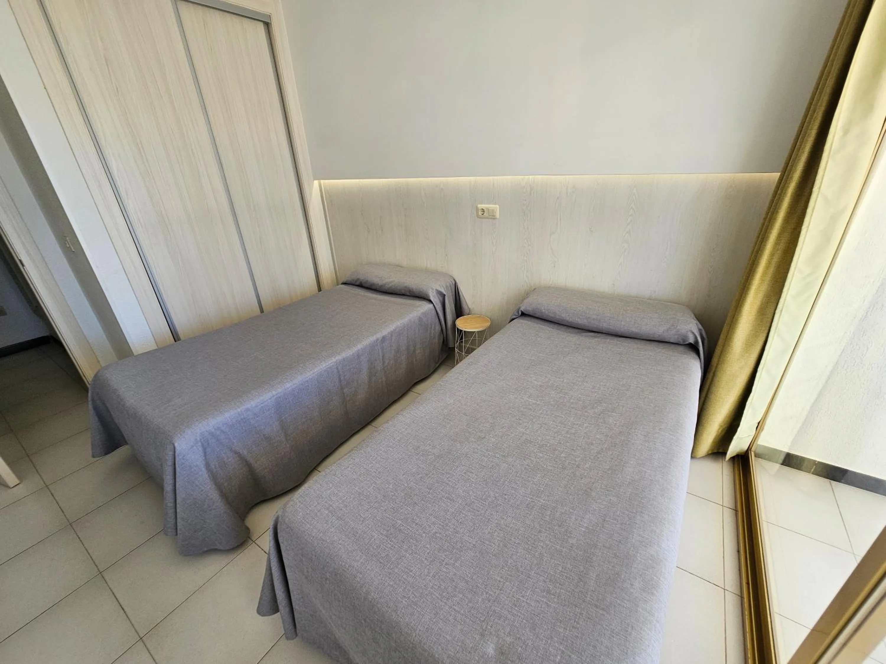 Bedroom, Bed in Apartamentos Maria Victoria