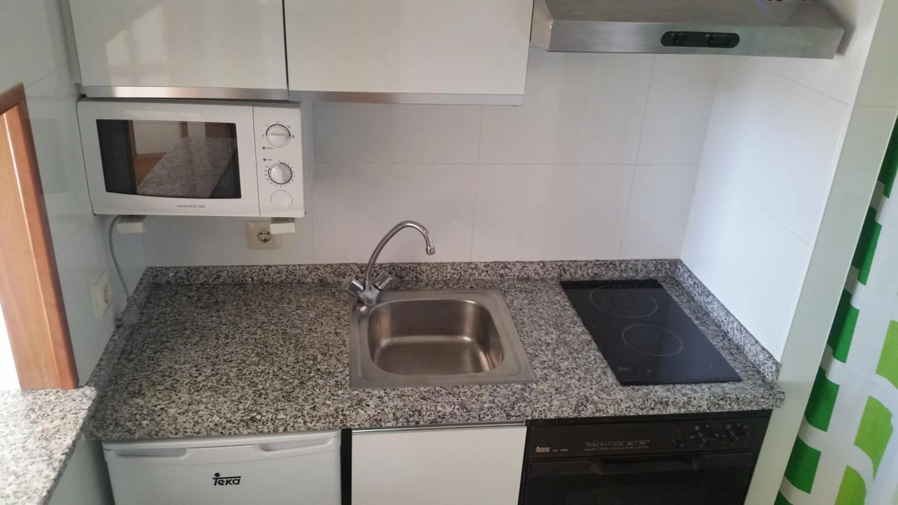 Kitchen or kitchenette in Apartamentos Maria Victoria