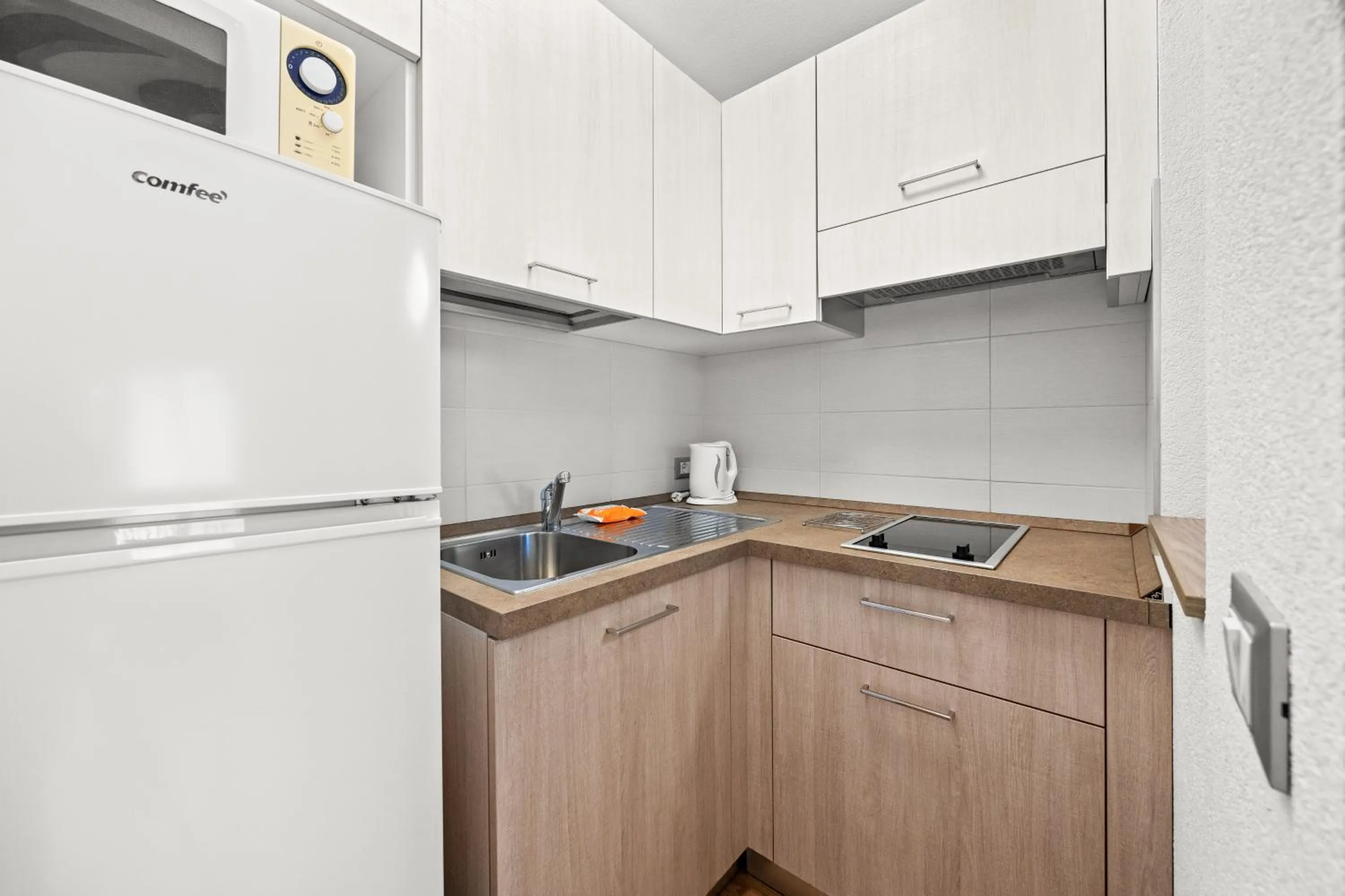 Kitchen or kitchenette in Aparthotel Des Alpes