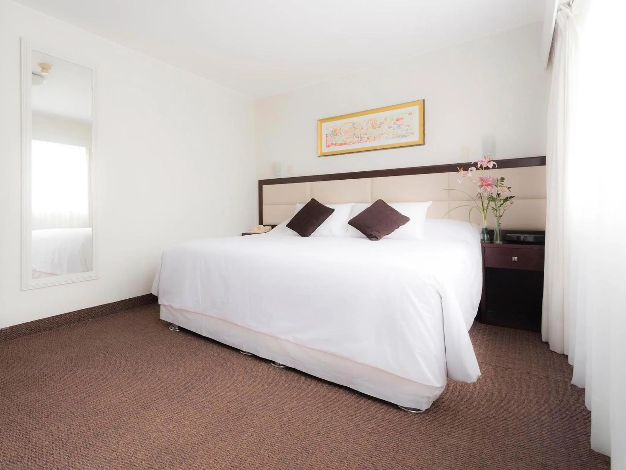 Bed in Roosevelt Hotel & Suites