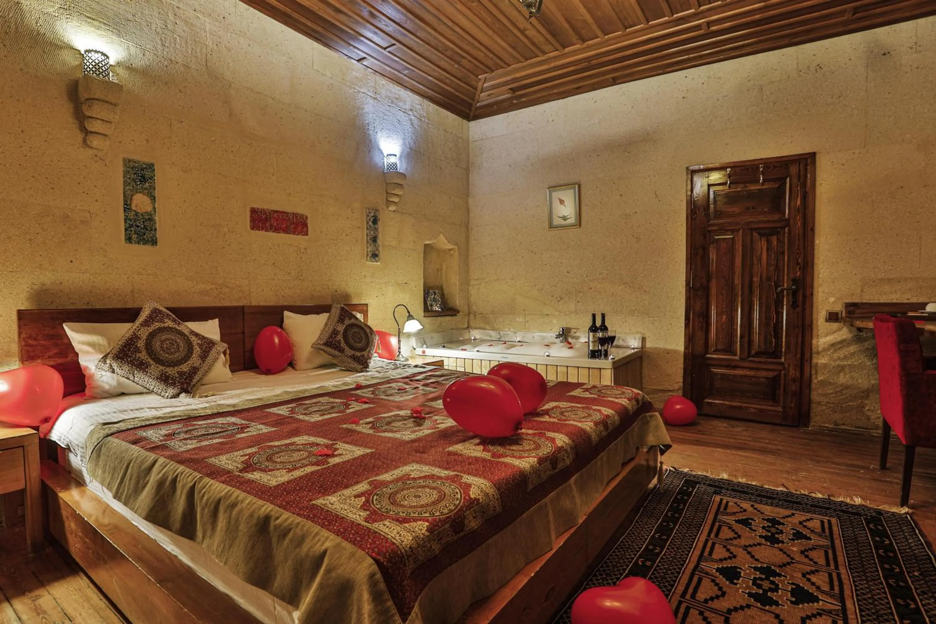 Bed in La Casa Cave Hotel